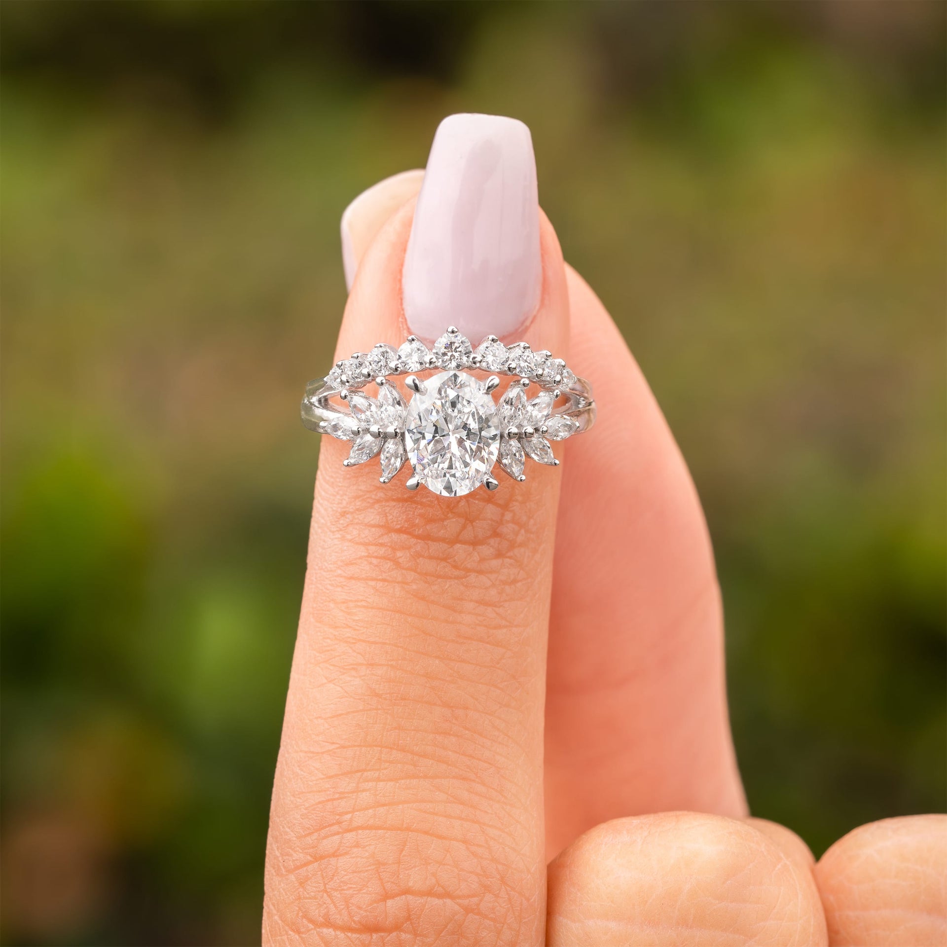 woman pinching madelyn engagement ring
