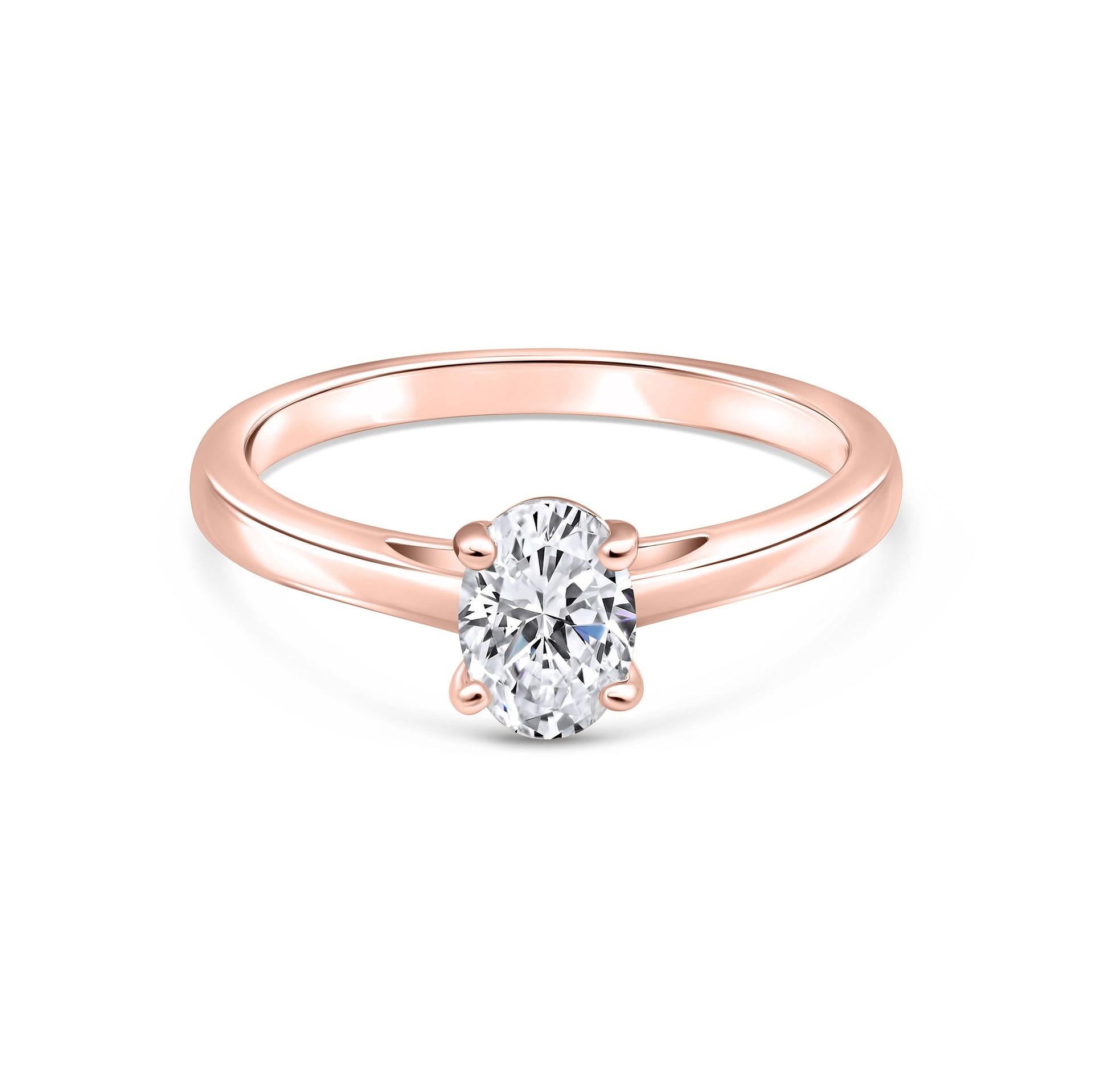 stunning rose gold petite oval engagement ring on white background