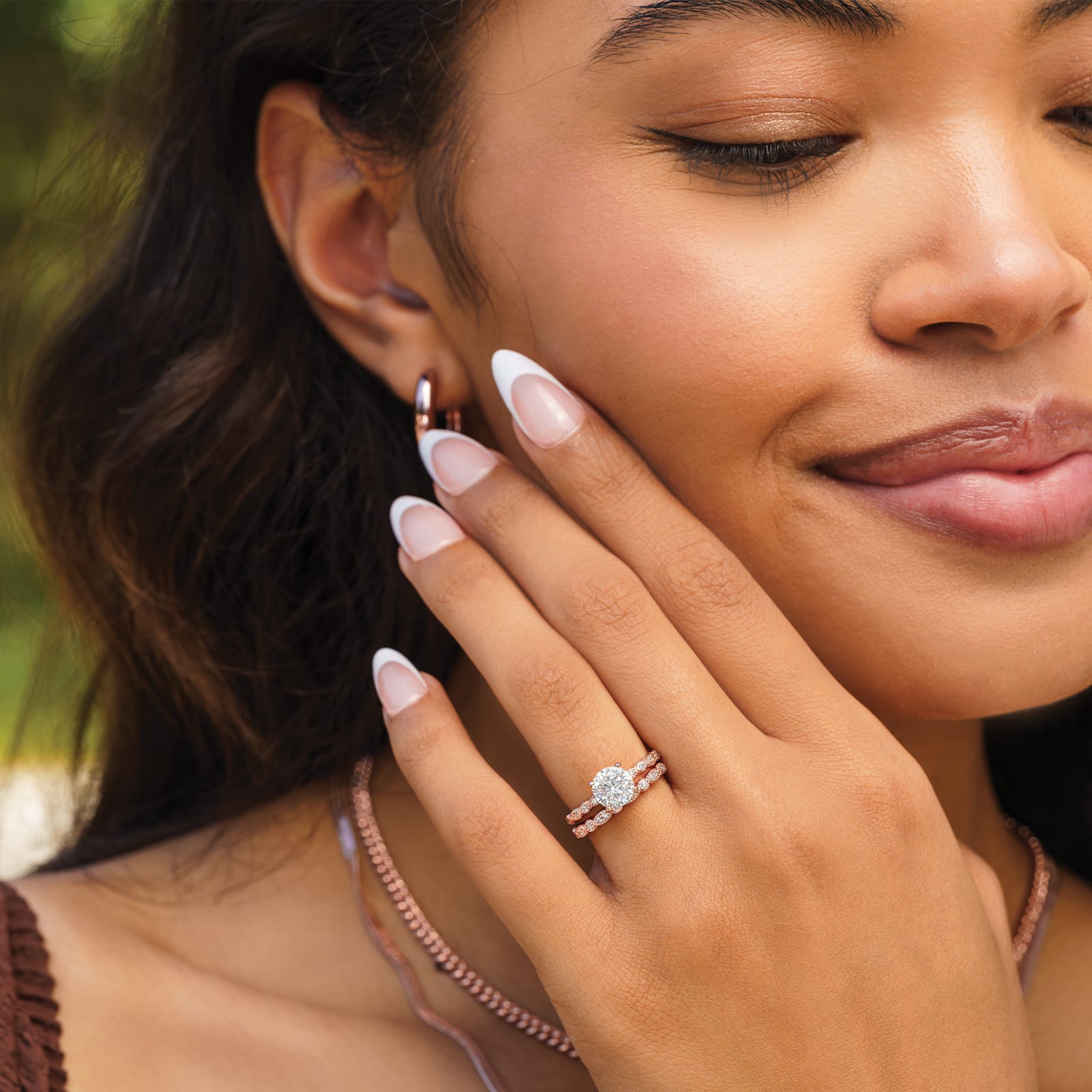 model wearing rose gold vintage engagement ring