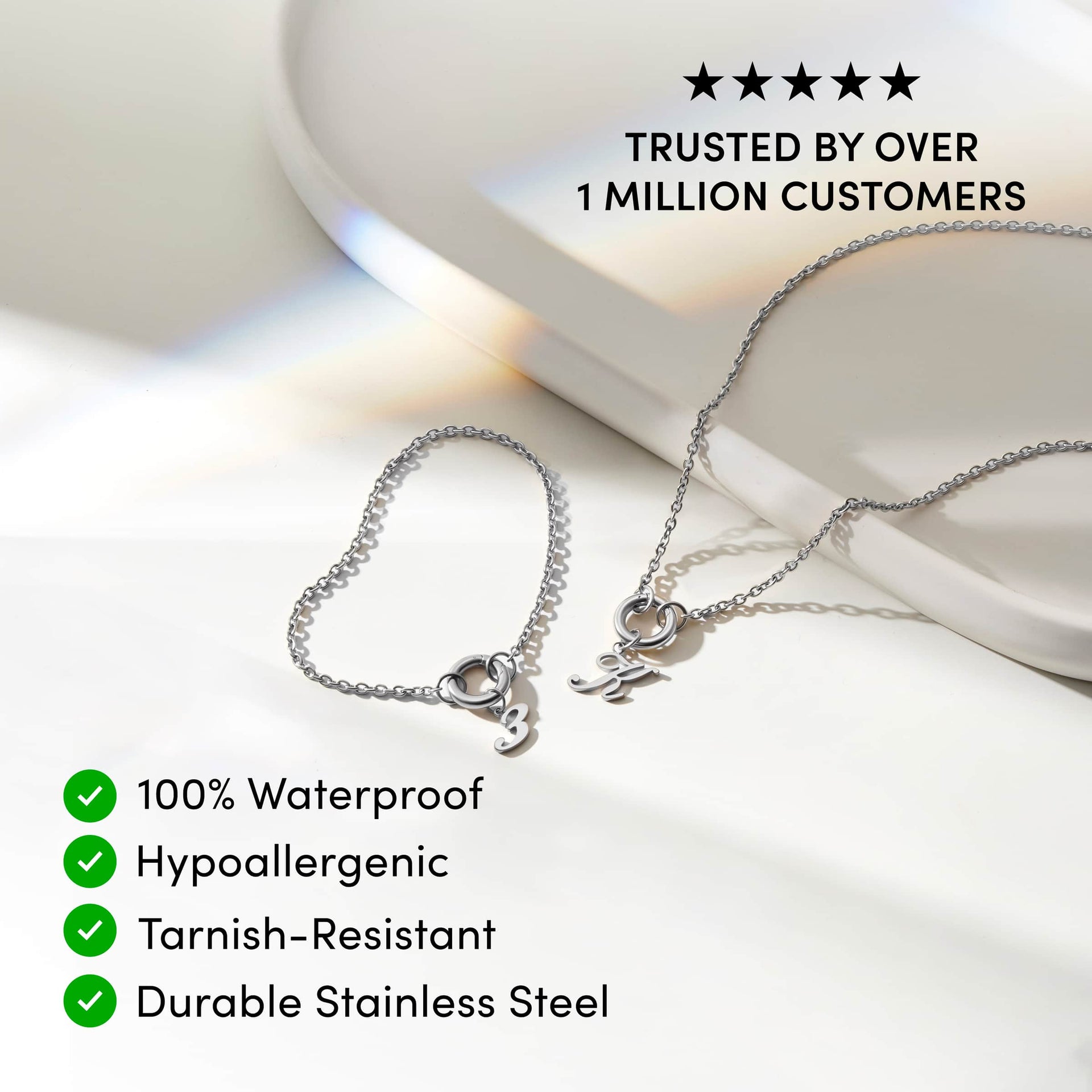 stainless steel cable chain charm bracelet  with a "3" charm & a charm necklace with a "K". In the top right corner, we have 5 black stars in a row with "TRUSTED BY OVER 1 MILLION CUSTOMERS" In the bottom left corner are four green circles with white checkmarks inside them aligned vertically. Next to each circle is the following text respectively: 100% Waterproof, Hypoallergenic, Tarnish-Resistant, Durable Stainless Steel