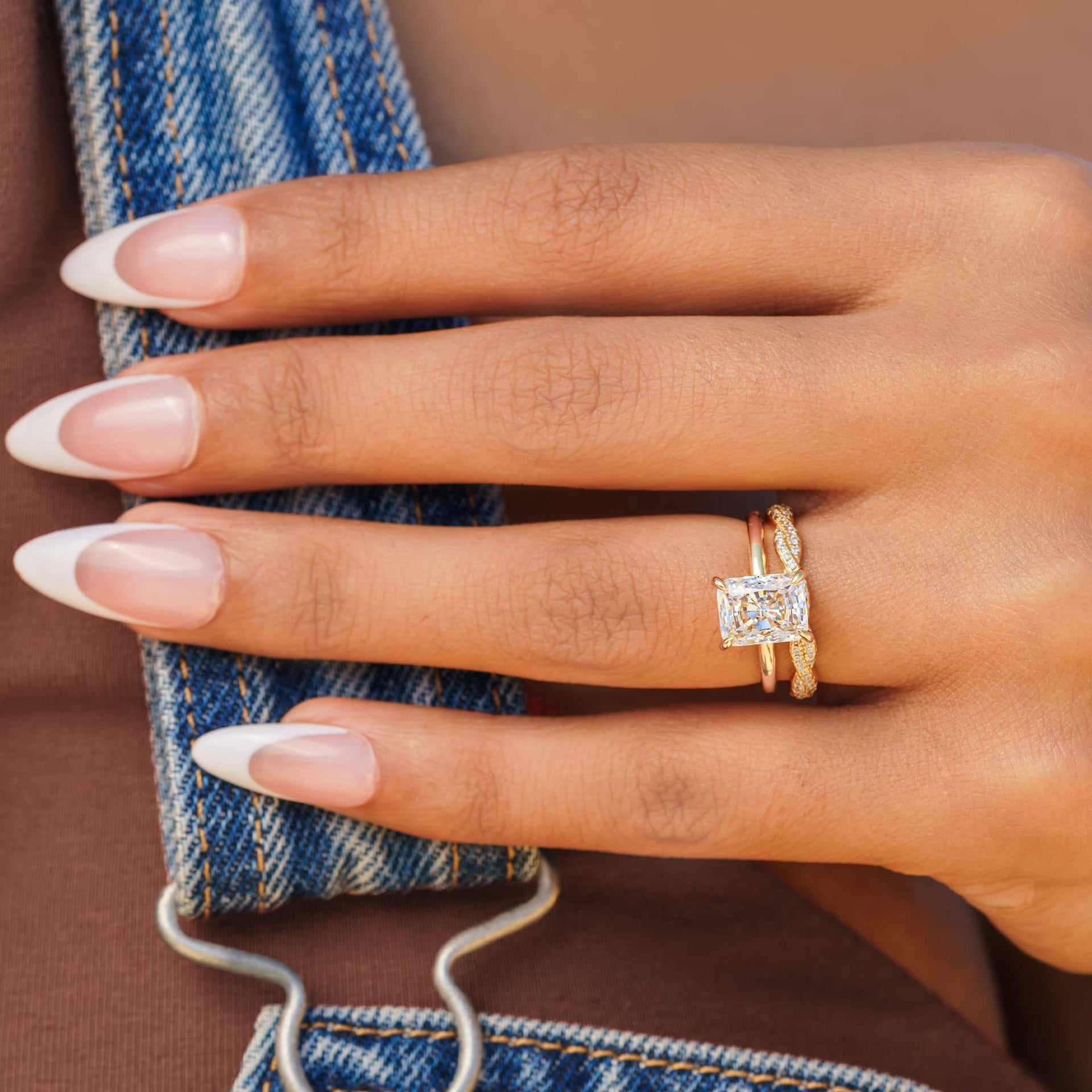 woman wearing gold sadie wedding band