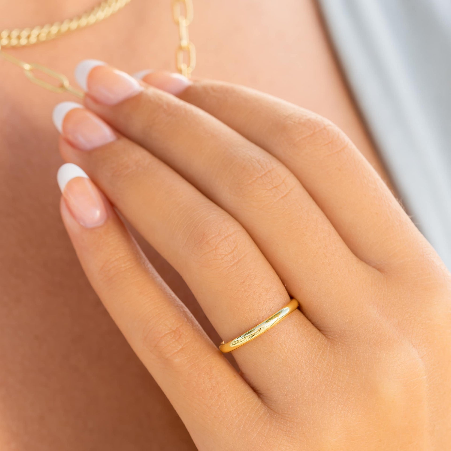 Minimal Gold Wedding Band on Female Hand