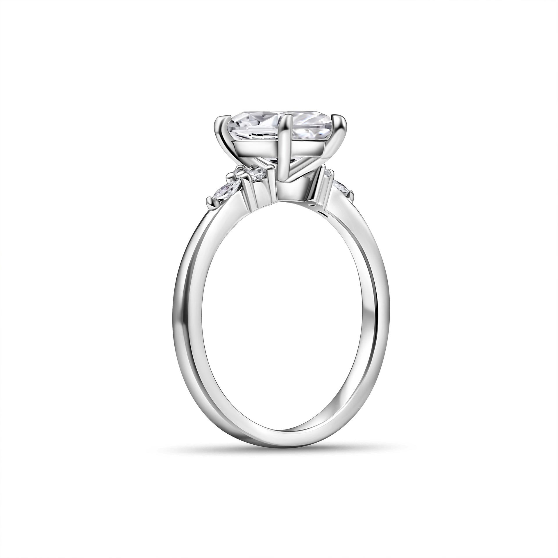 stunning side setting of marquise engagement ring with sleek band shown in silver