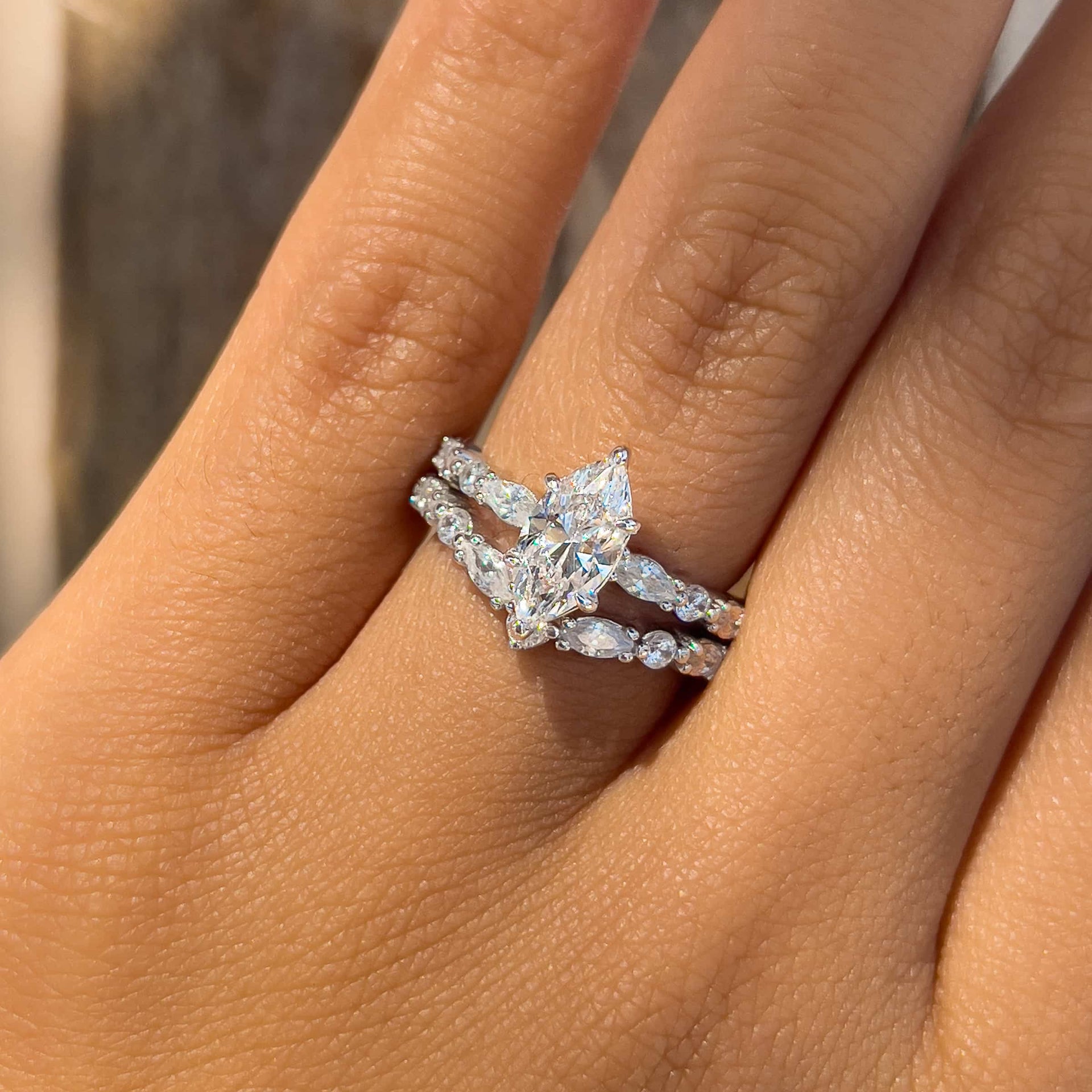 silver vintage style marquise cut wedding ring set on female model
