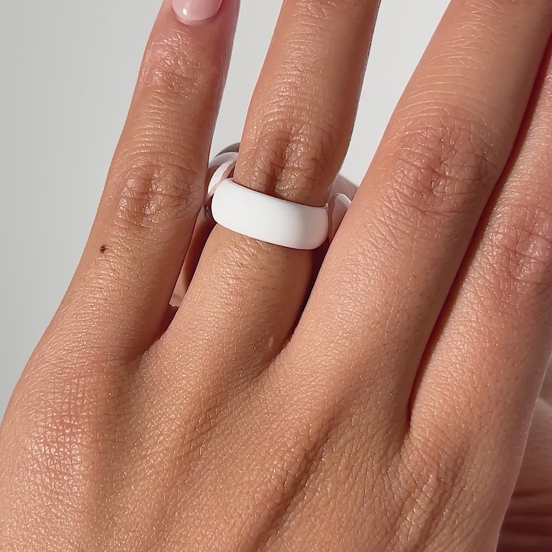 video of white versatile silicone band being worn by model