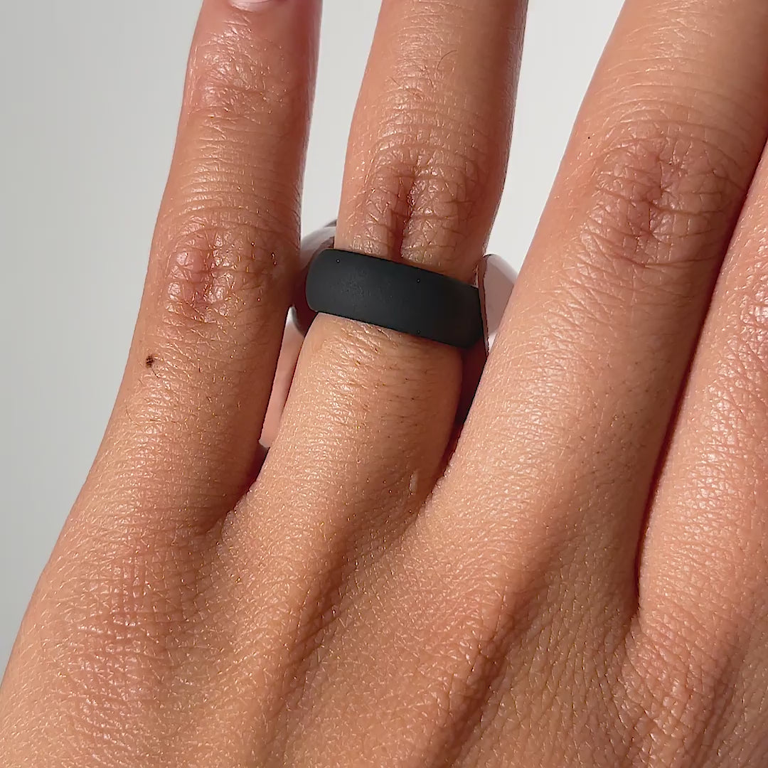 video of black versatile silicone band being worn by model