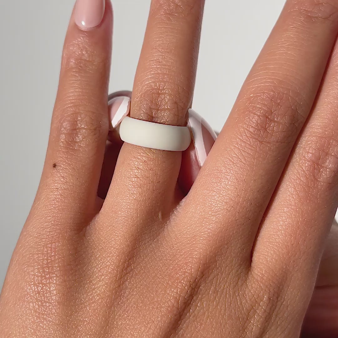 video of tan versatile silicone band being worn by model