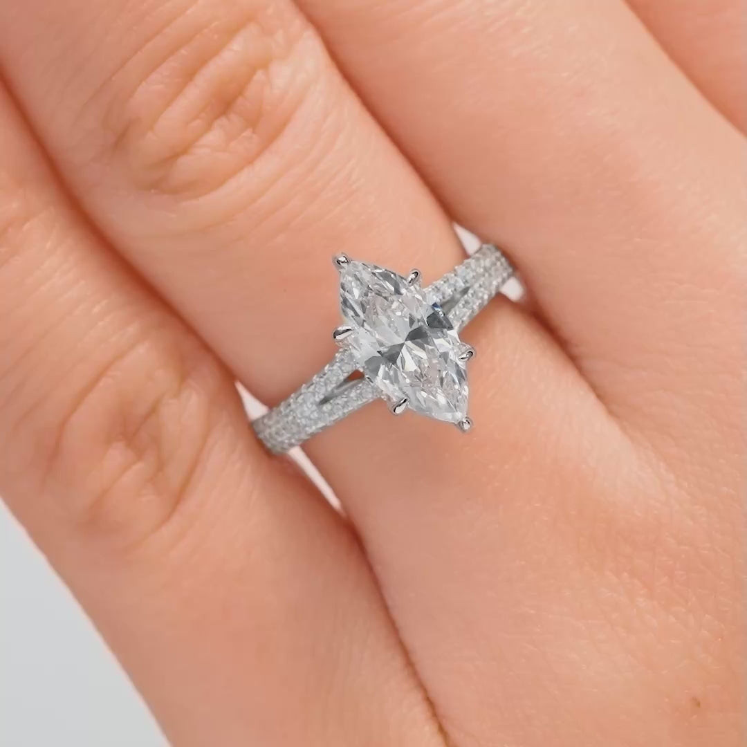video of stunning silver 2 carat marquise cut vintage split shank engagement ring on model