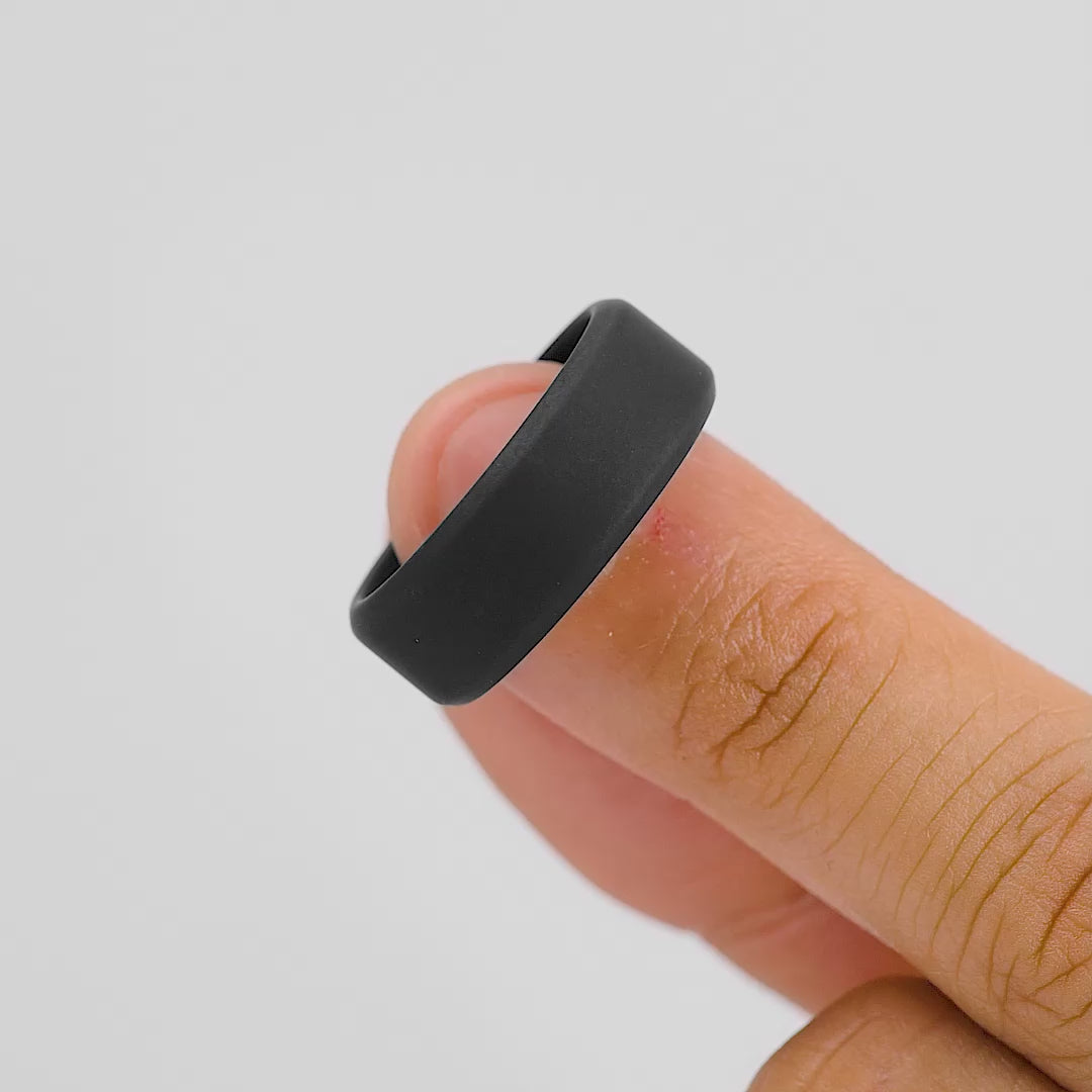 video of sleek black silicone wedding band