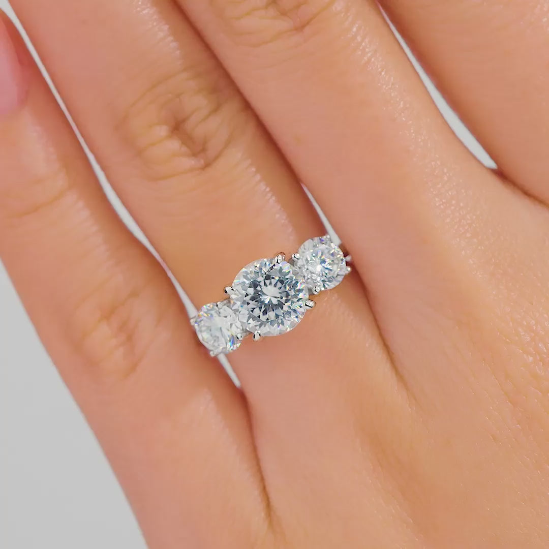 video showcasing the trinity silver round cut engagement ring shown on model's hand