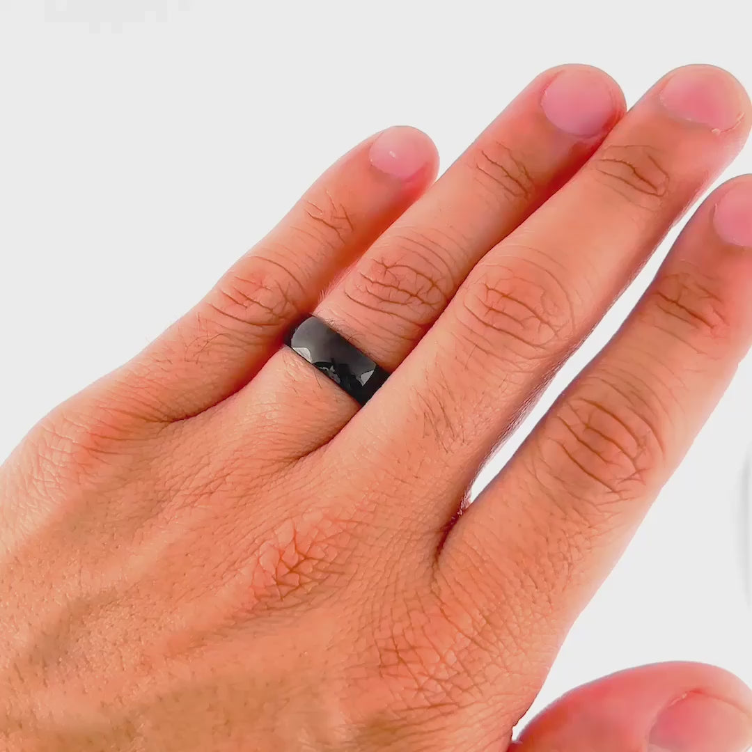 video of an affordable black mens Horizon wedding ring showcased on man's hand