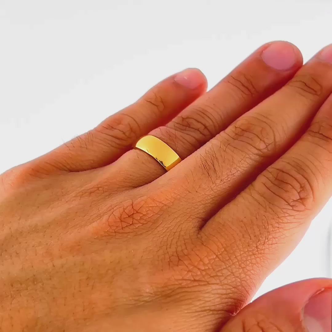 affordable gold unisex Horizon wedding ring showcased on a man's hand