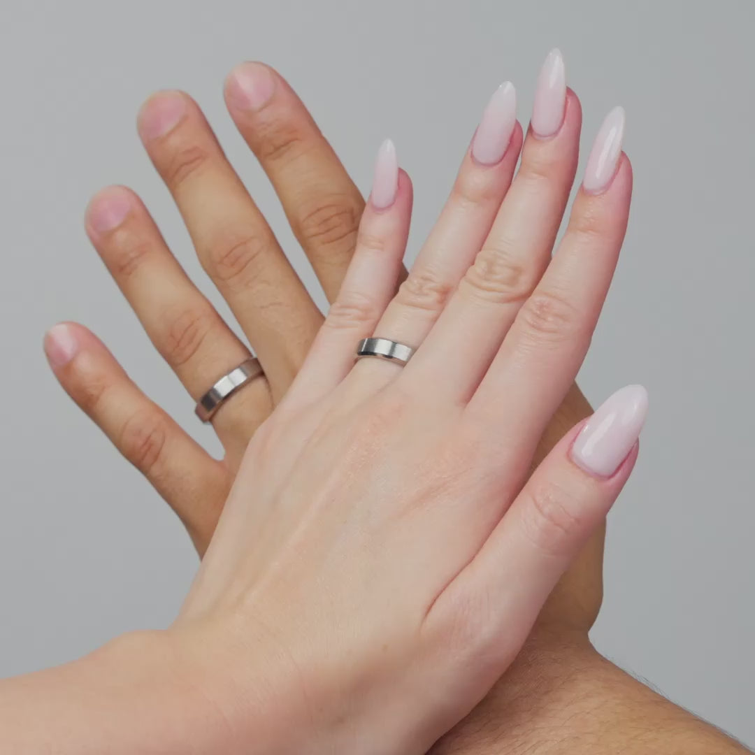 video of male and female model wearing a silver slim 5mm stainless steel unisex band
