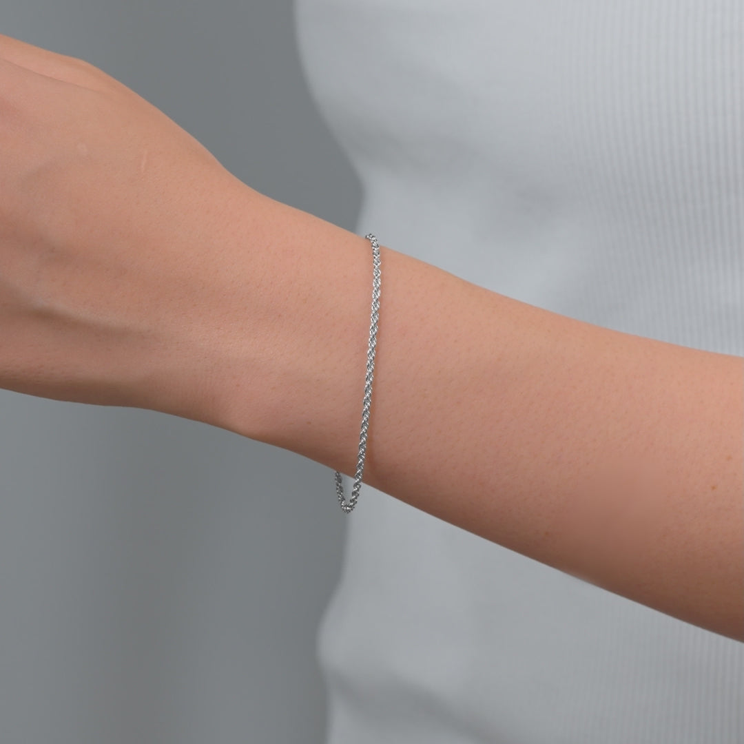 video of a silver rope style bracelet on model 