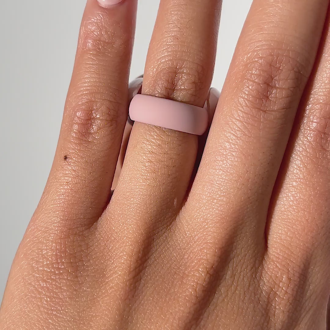 video of light pink versatile silicone band being worn by model