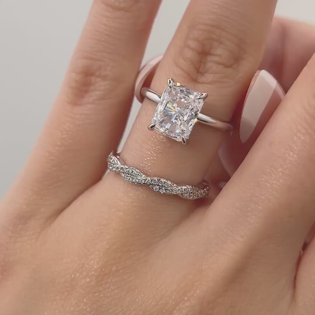 video of stunning unique silver 3 carat radiant cut wedding ring set shown on model