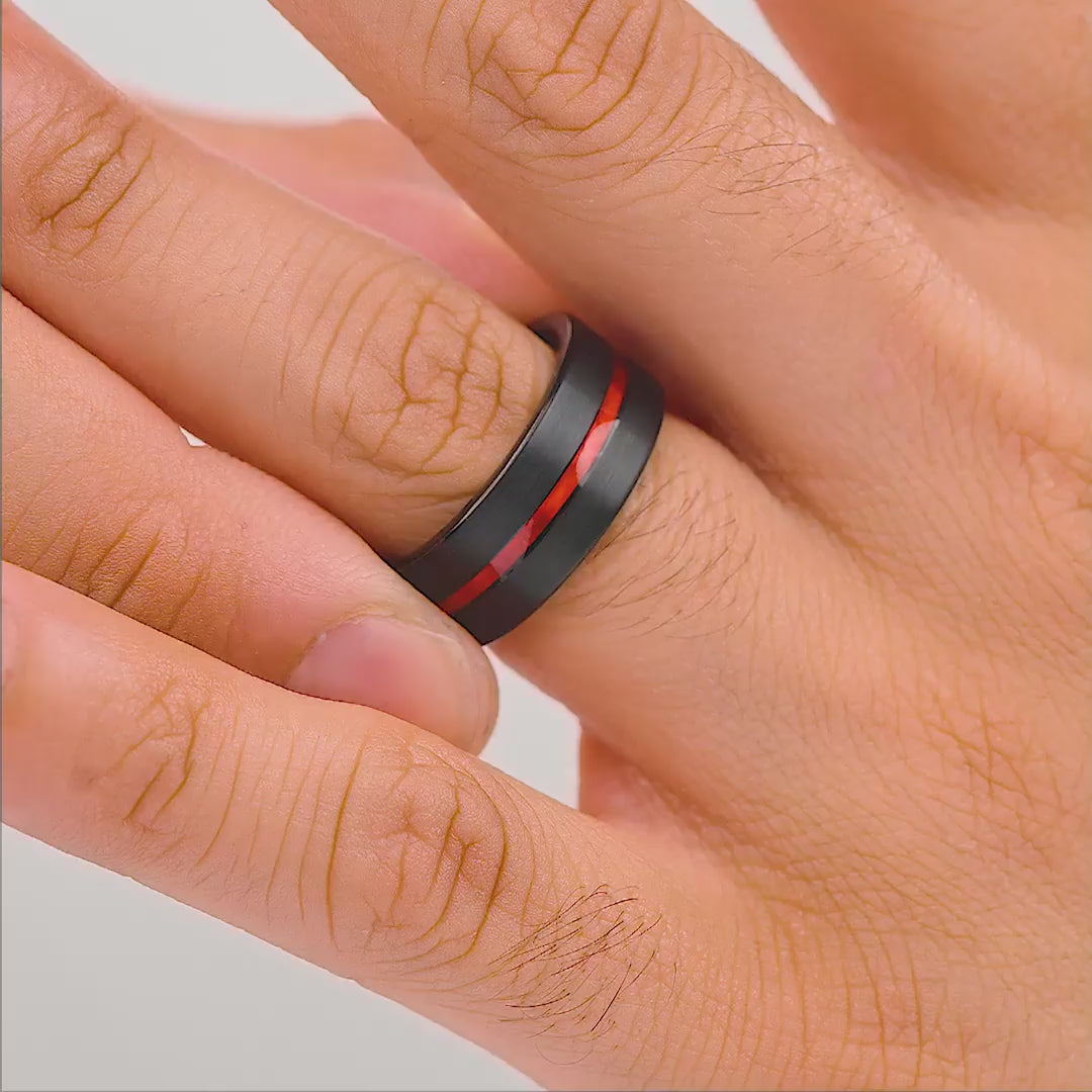 mens black tungsten ring shown in wiggle