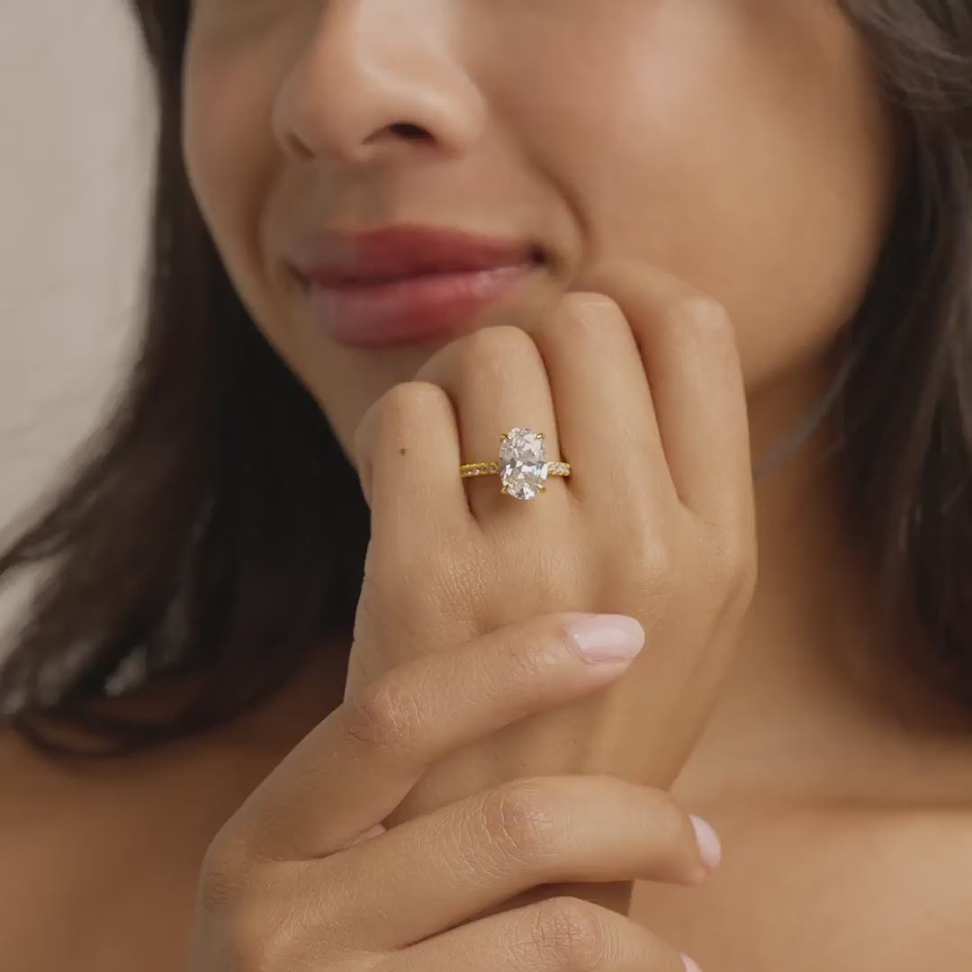 video of gold 4 carat oval cut half eternity engagement ring on model