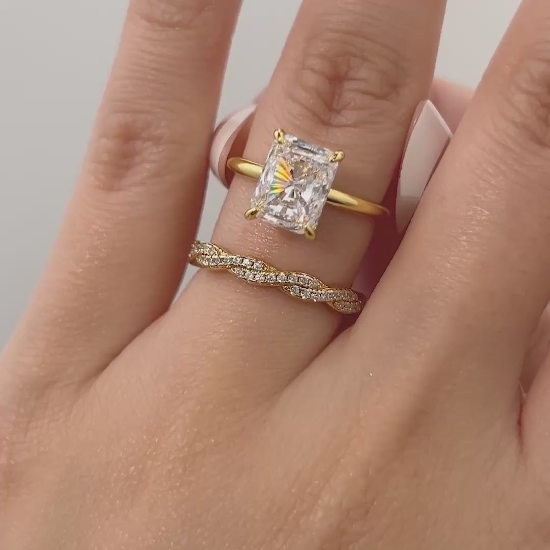 video of stunning unique gold 3 carat radiant cut wedding ring set shown on model