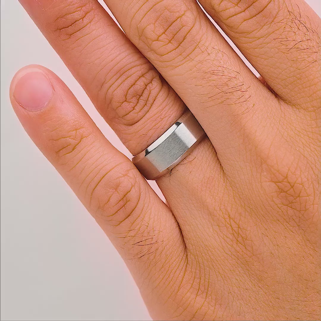 men's silver titanium wedding band shown in wiggle