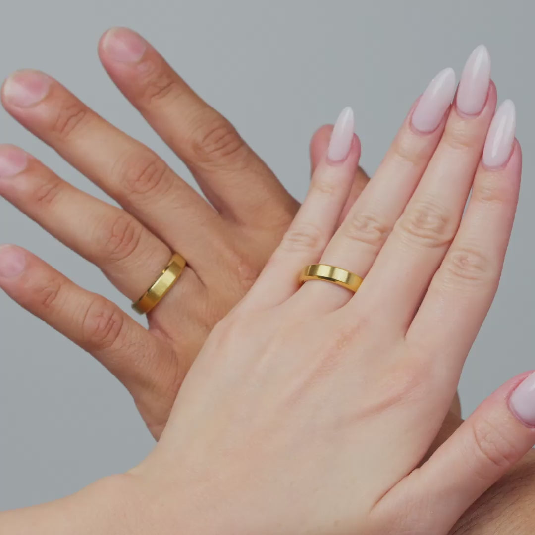 video of male and female model wearing a gold slim 5mm stainless steel unisex band