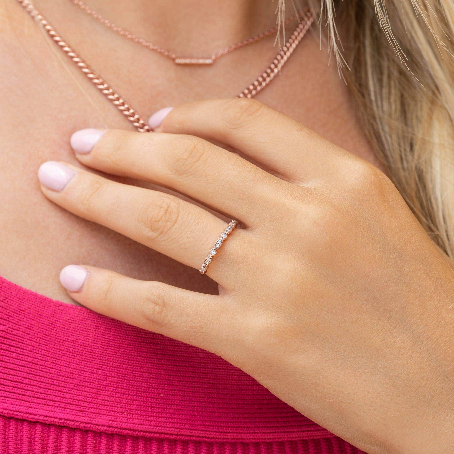 girl wearing vintage rose gold wedding band