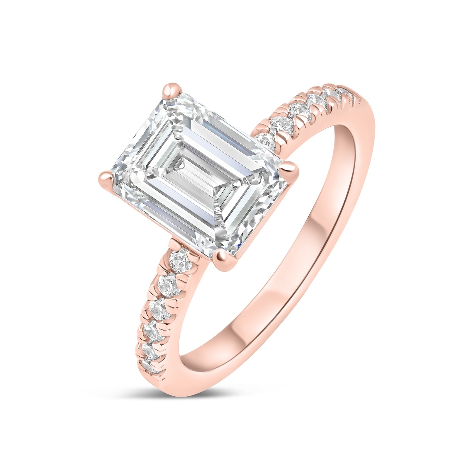 stunning emerald cut rose gold ring on white background