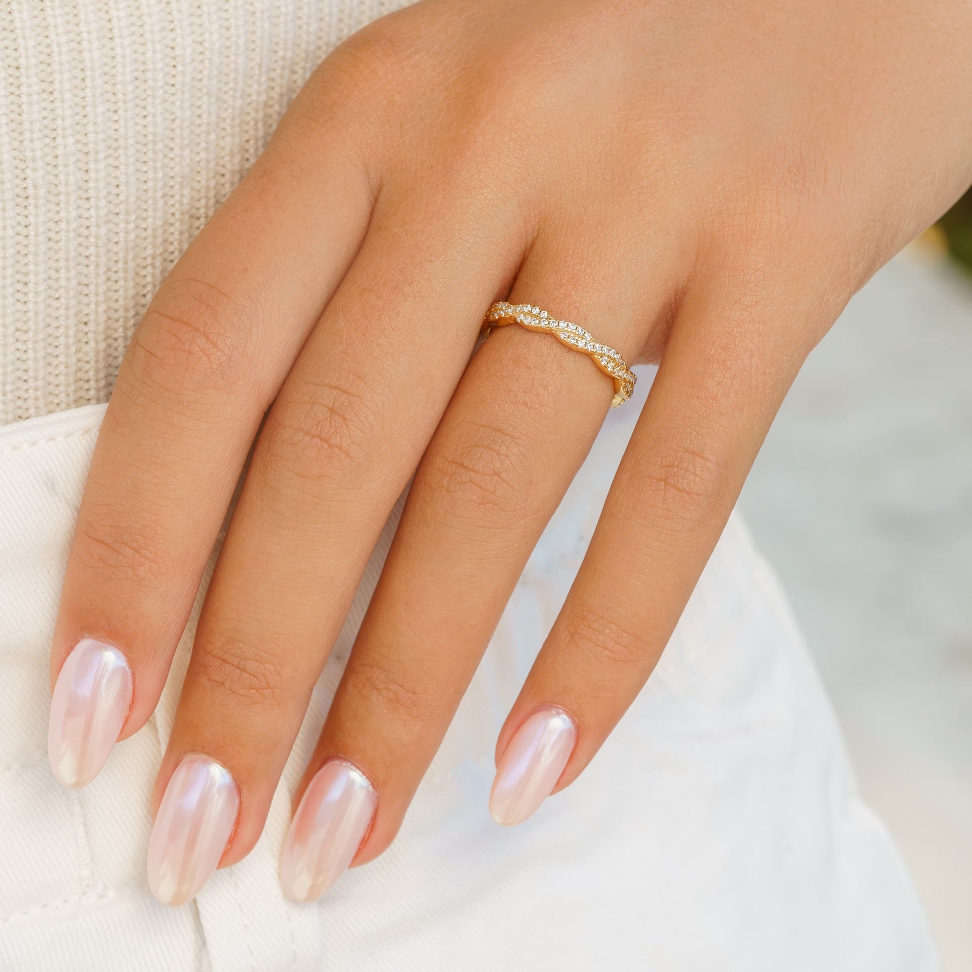 woman wearing gorgeous gold wedding band