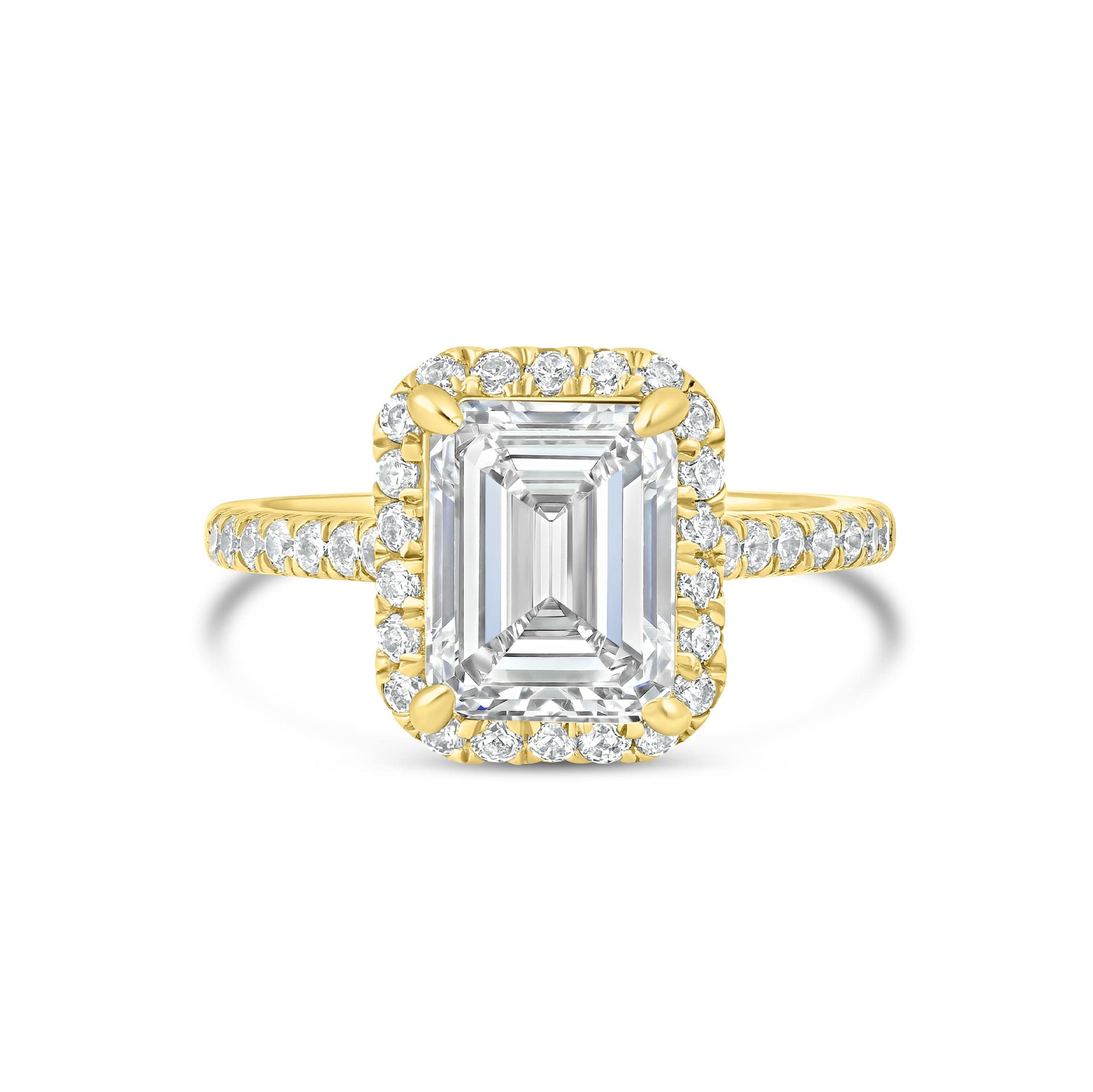 stunning emerald cut engagement ring on white background