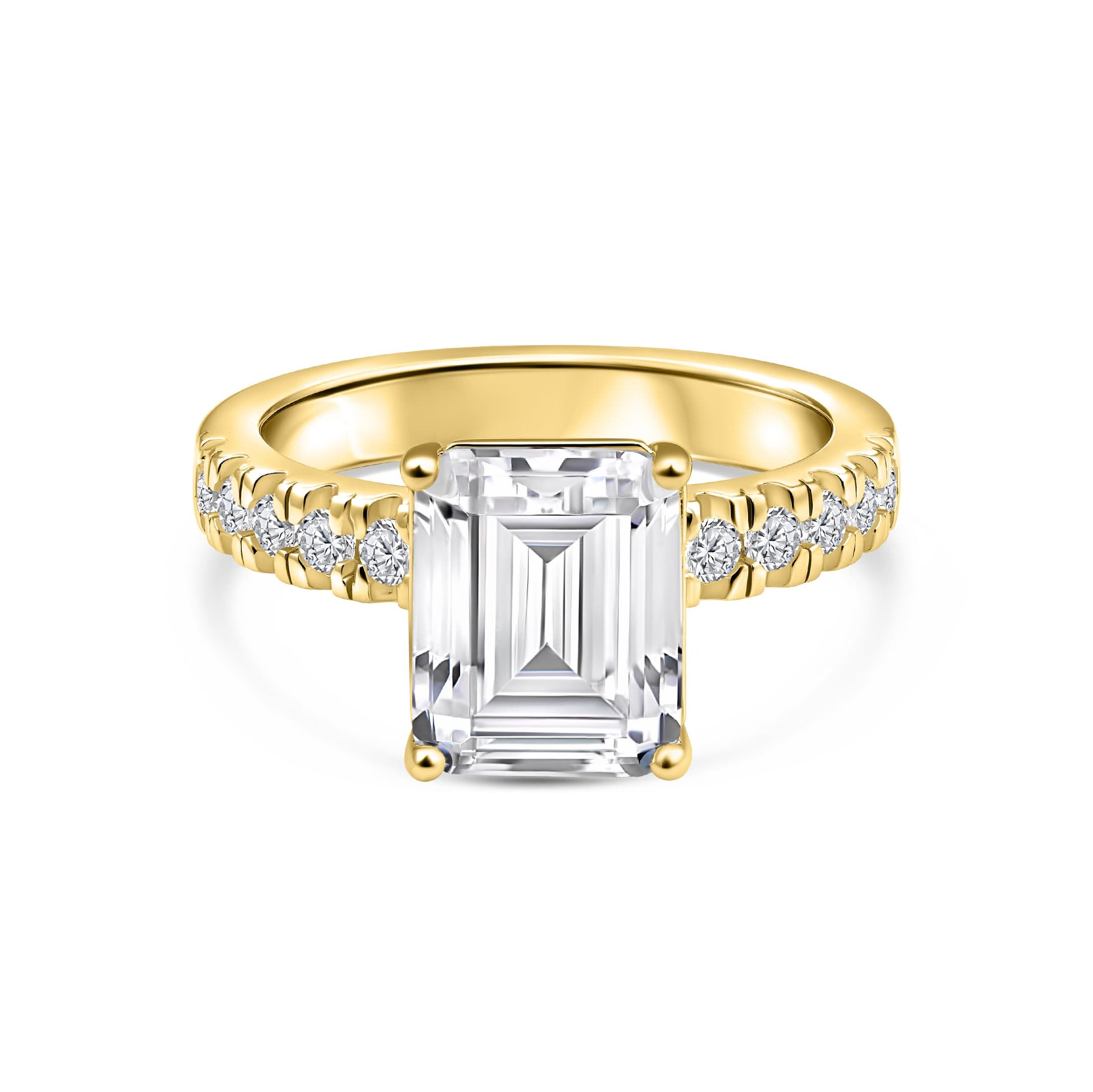 stunning gold emerald cut engagement ring on white background