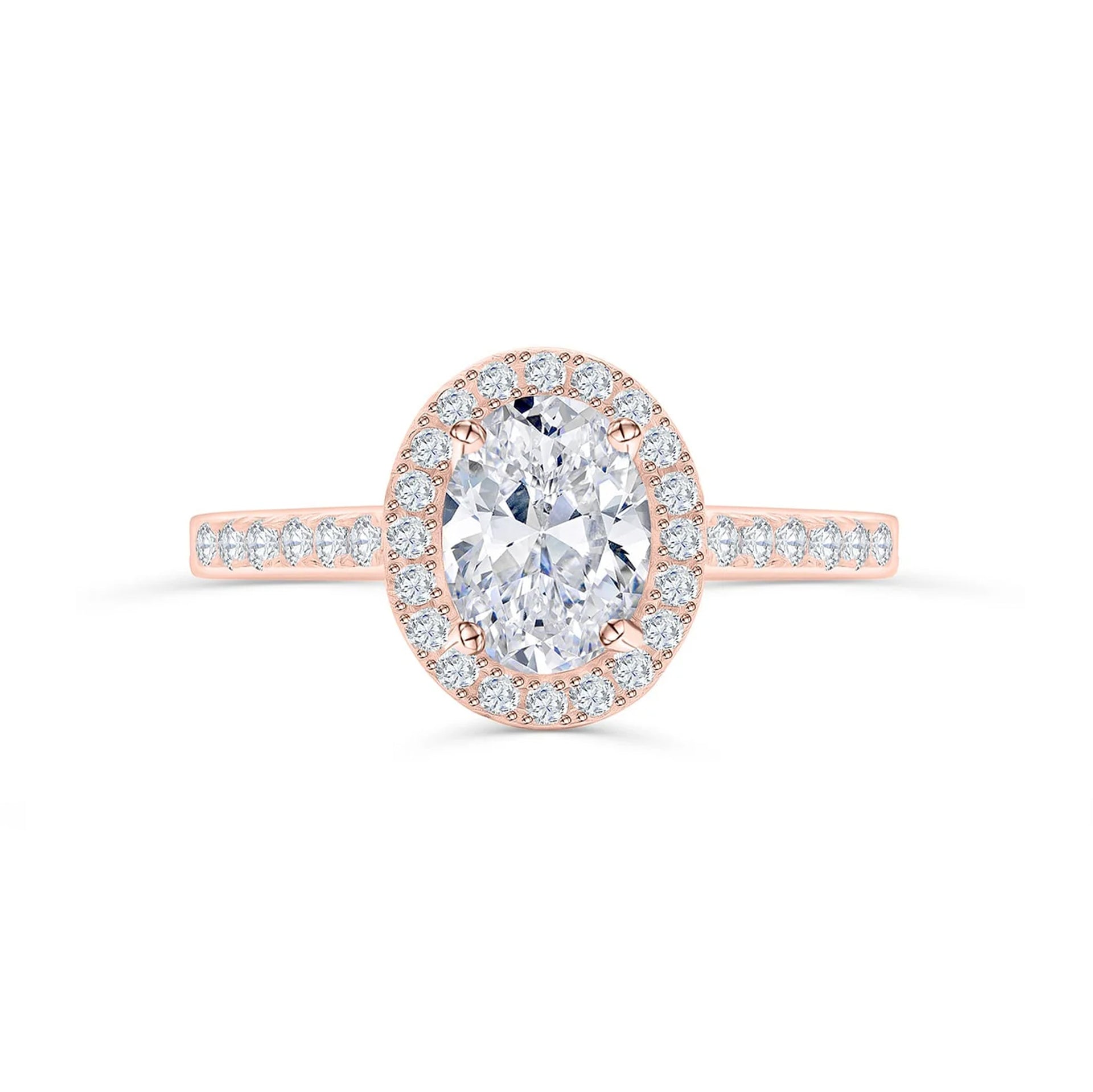 a rose gold oval cut engagement ring shown on a white background