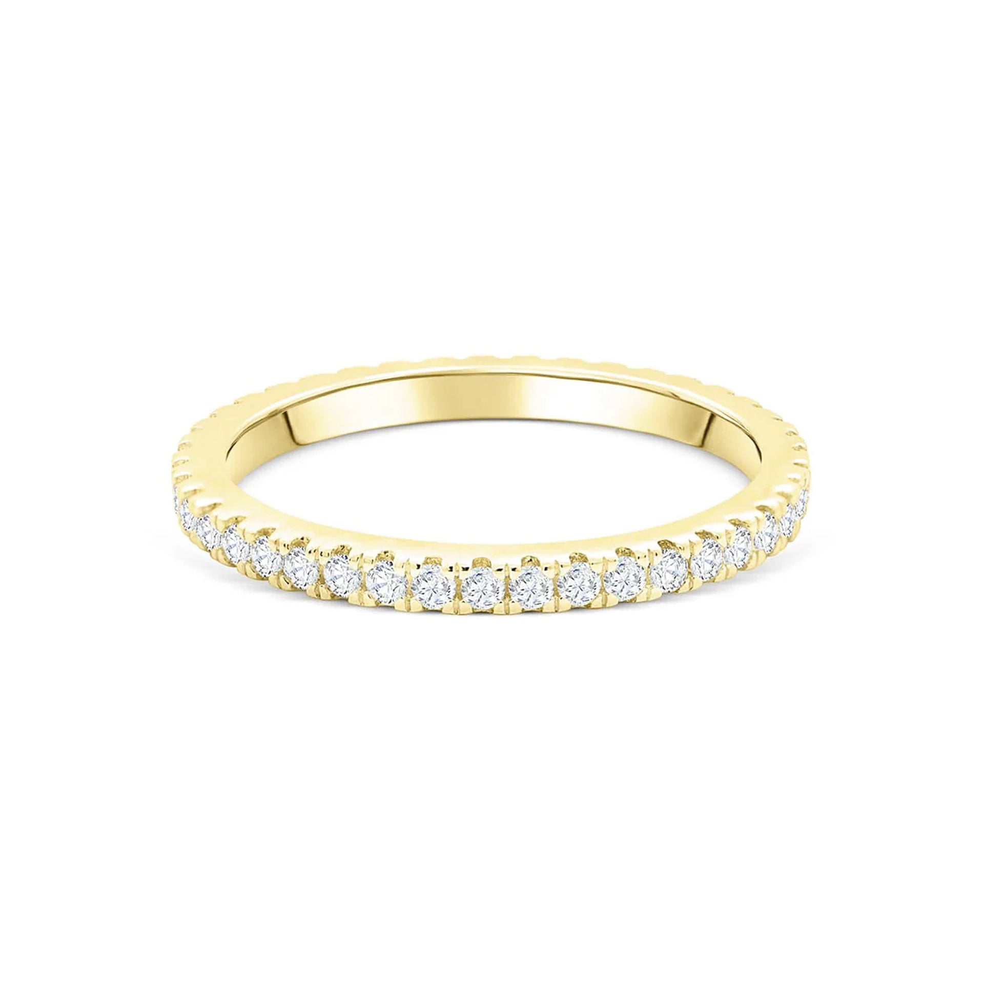 stunning eternity gold wedding band on white backdrop