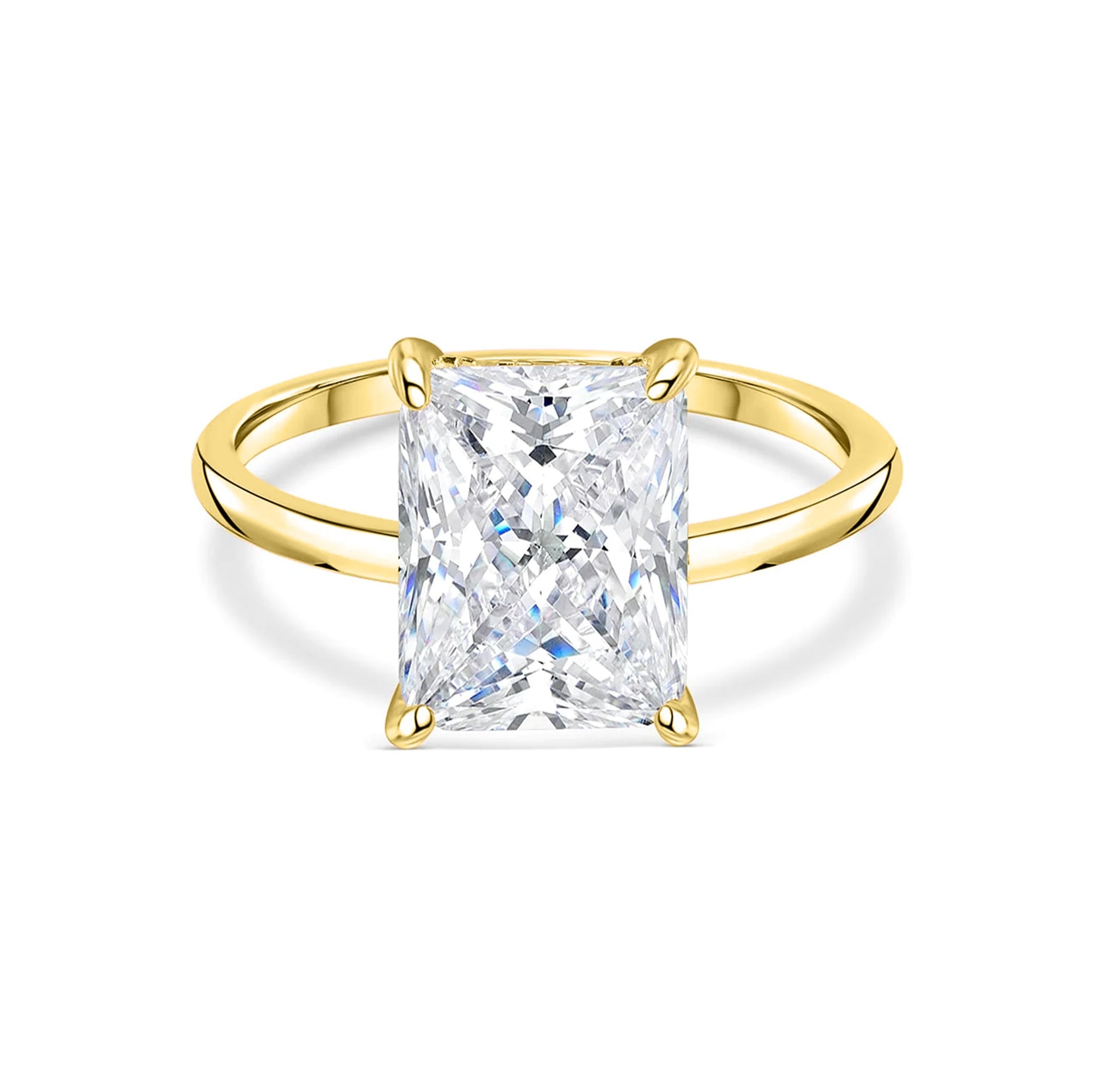 stunning gold radiant cut engagement ring on white background