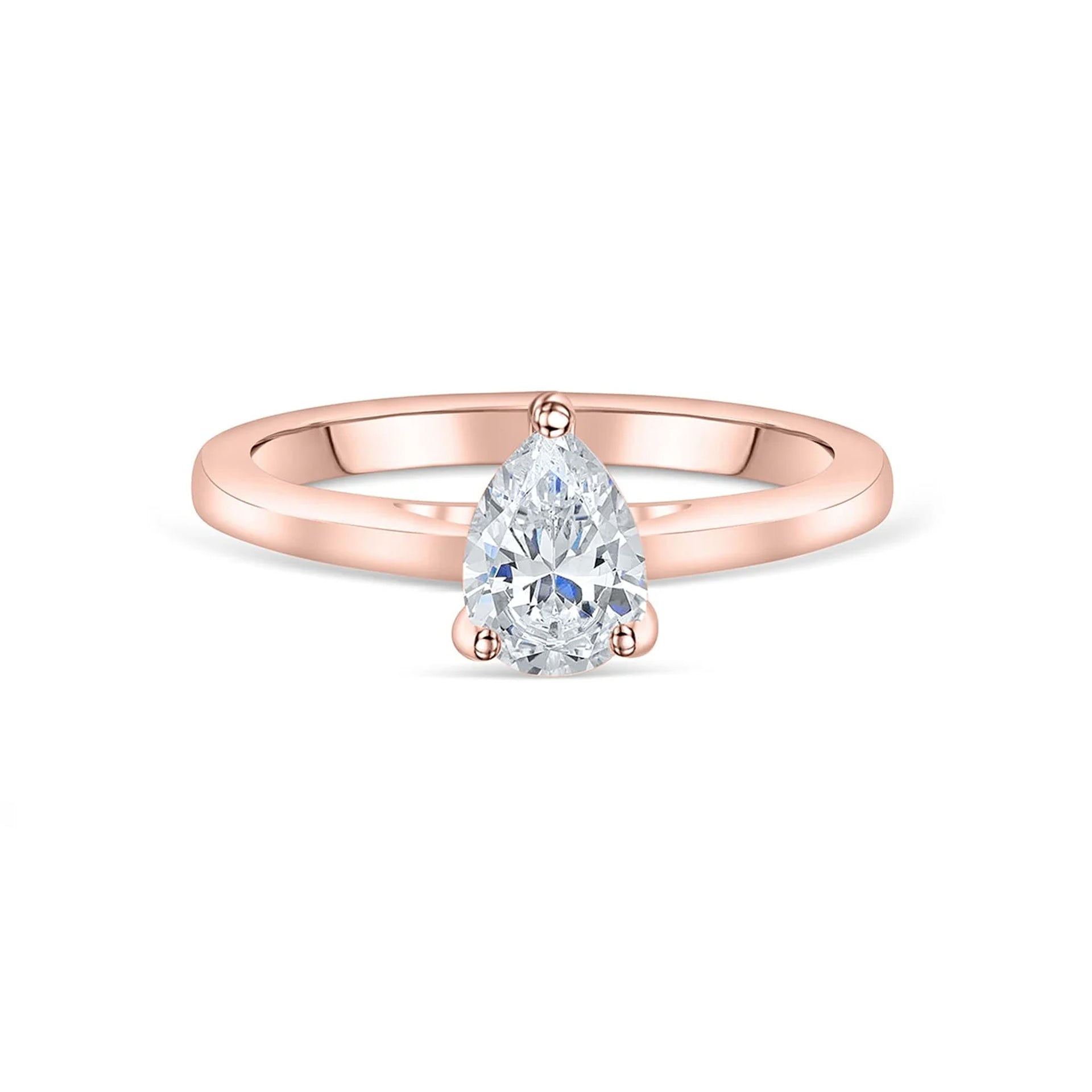 unique rose gold pear cut engagement ring on white background