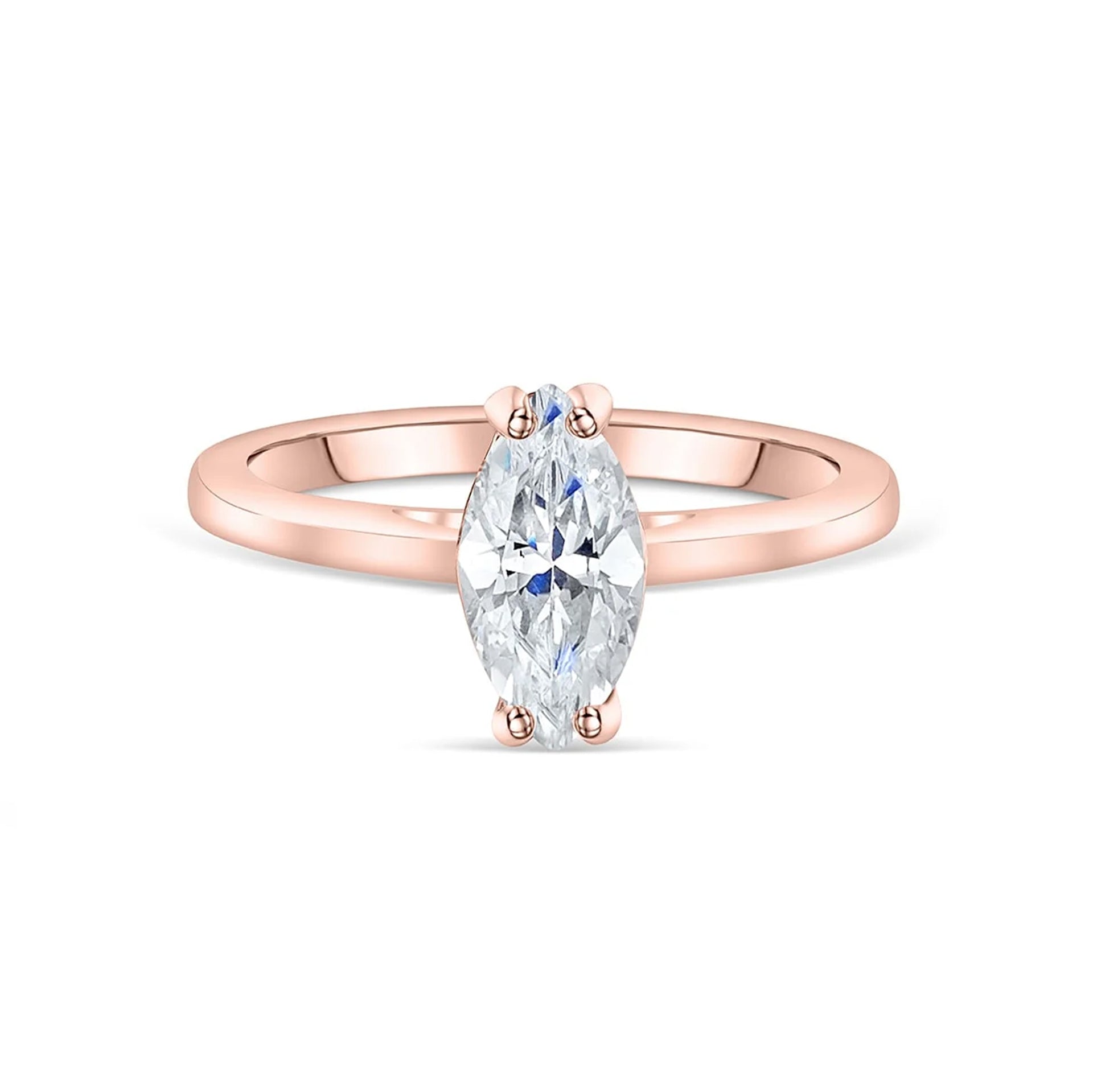 stunning rose gold marquise engagement ring on white background