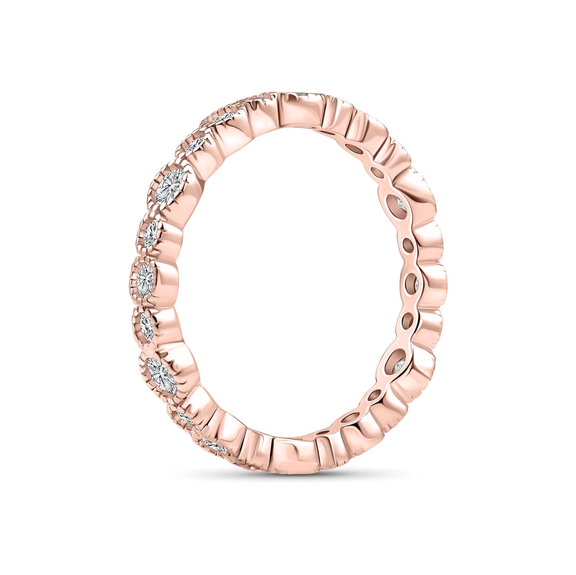 side angle of rose gold wedding set shown on white background