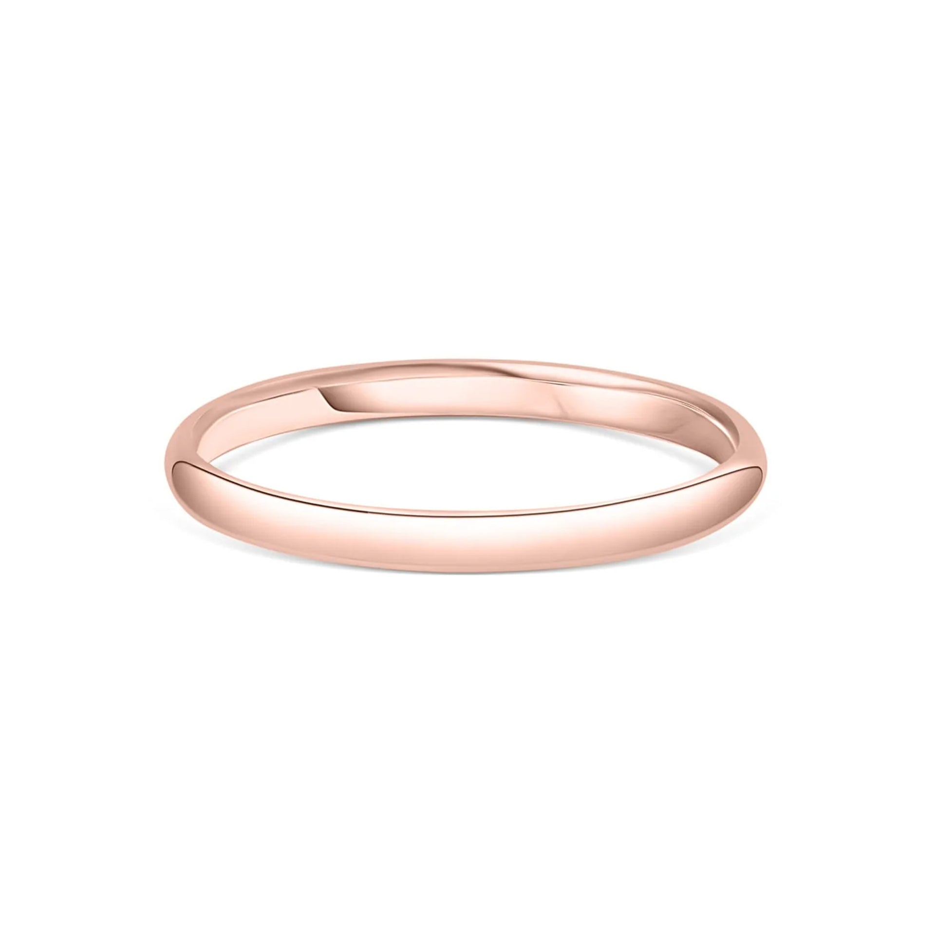 stunning rose gold wedding band on white background