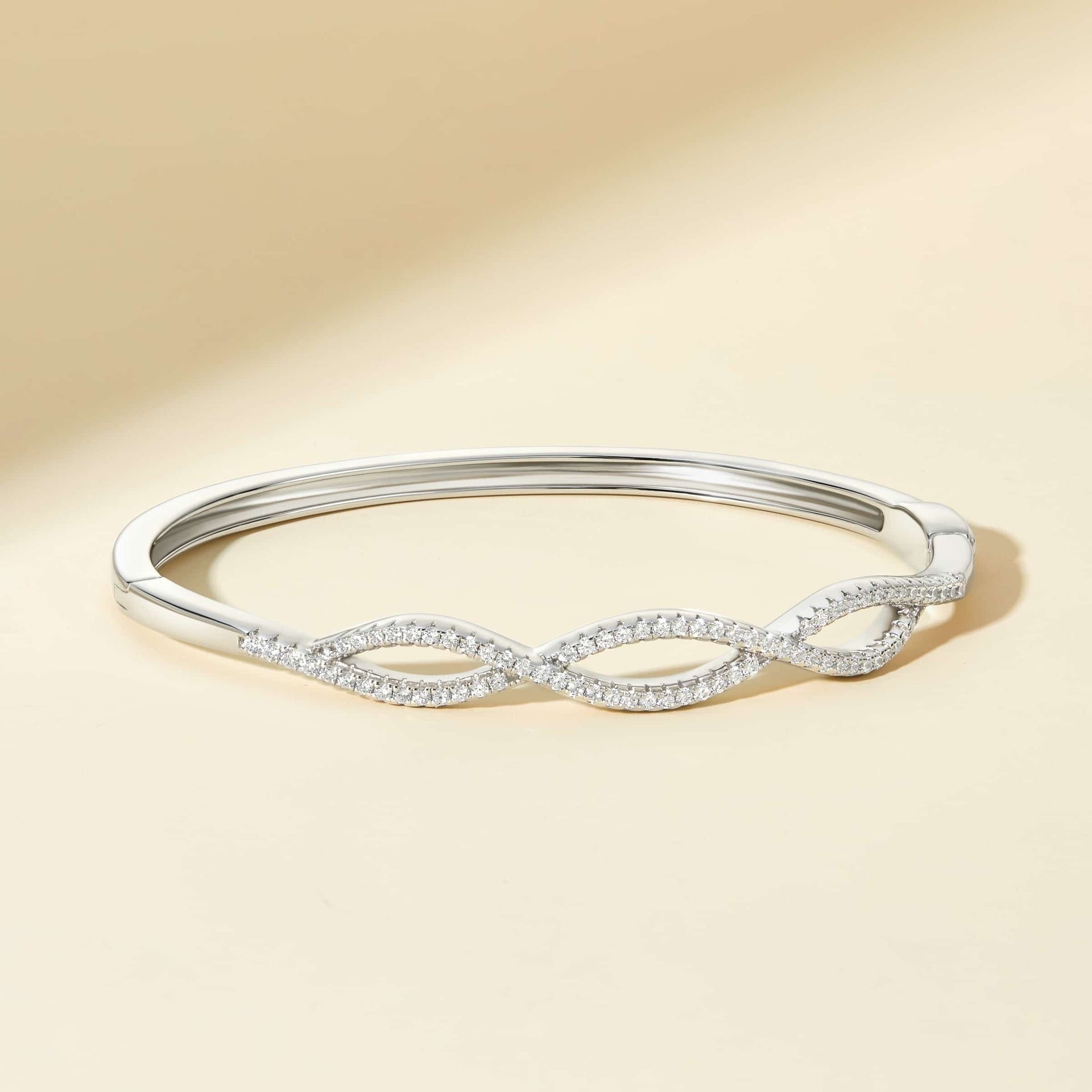 the nova silver twist bracelet on cream backdrop