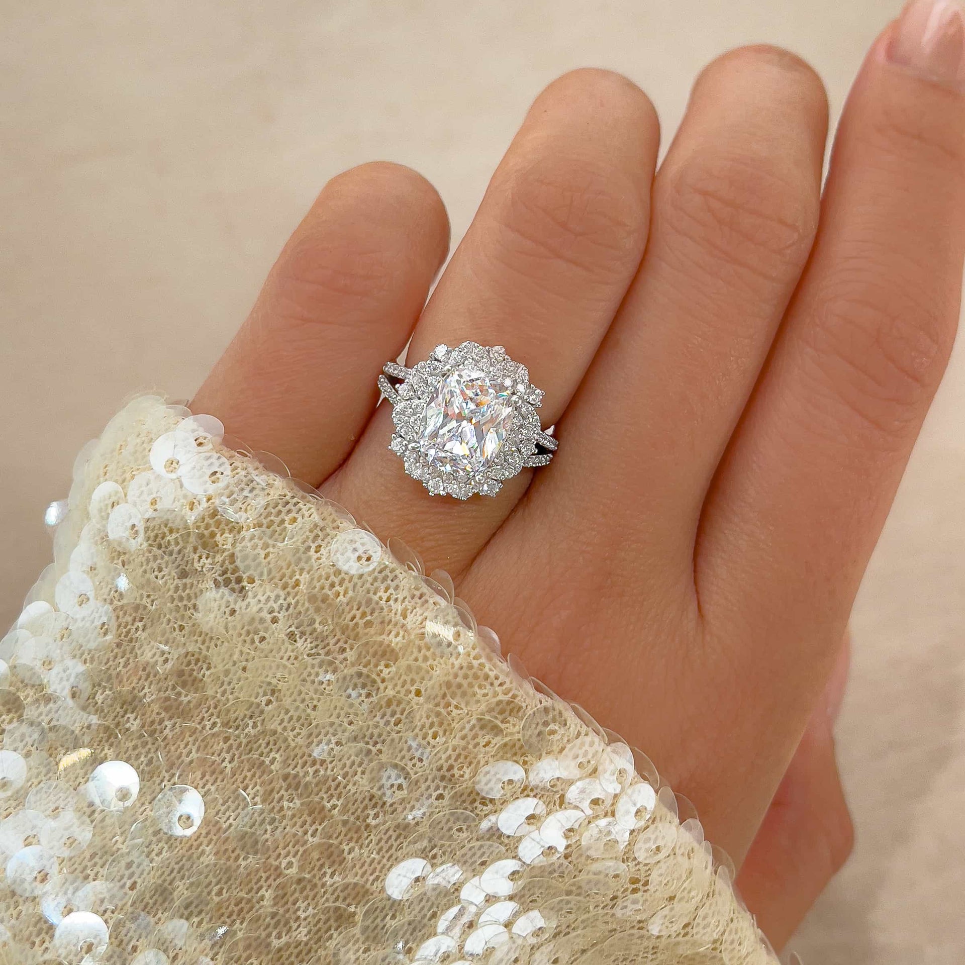 stunning vintage elongated cushion cut engagement ring on model 