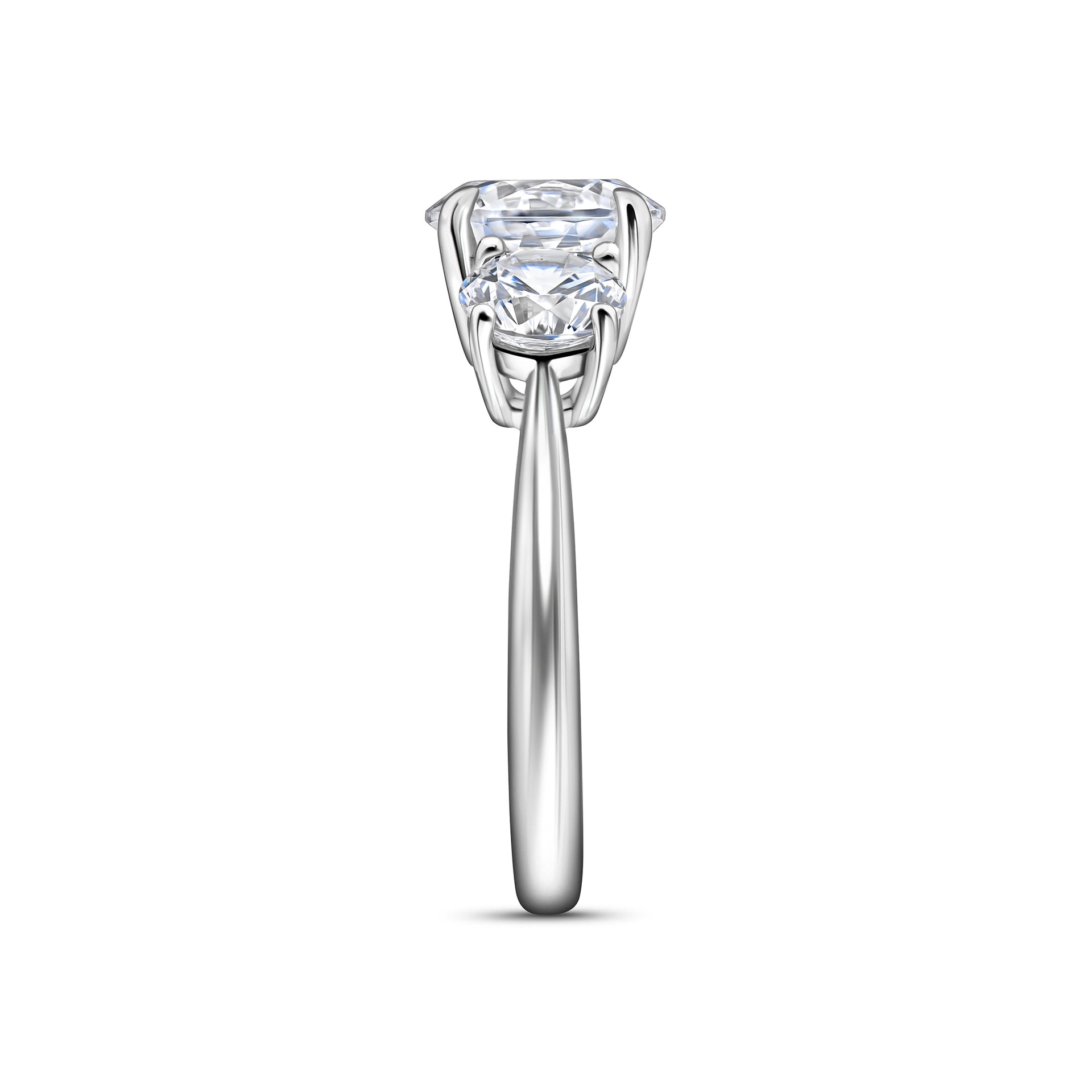 trinity silver round cut engagement ring shown on white