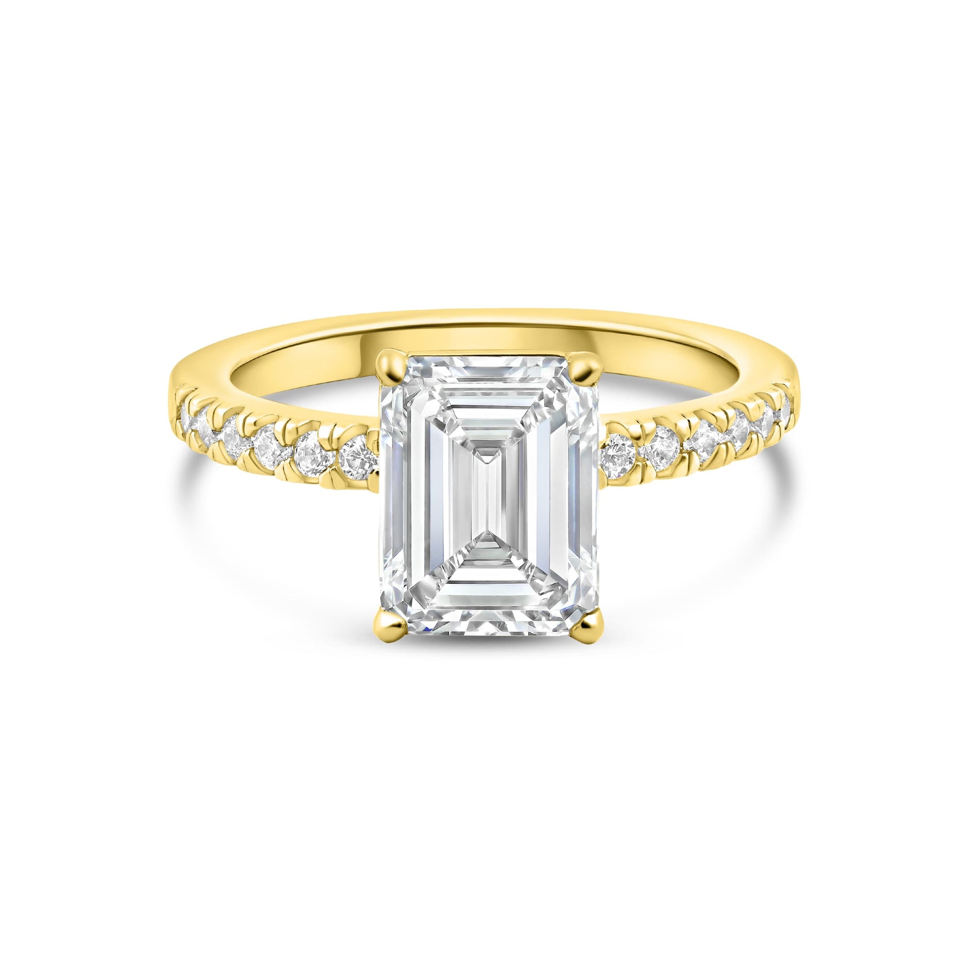 stunning gold emerald cut engagement ring on white background