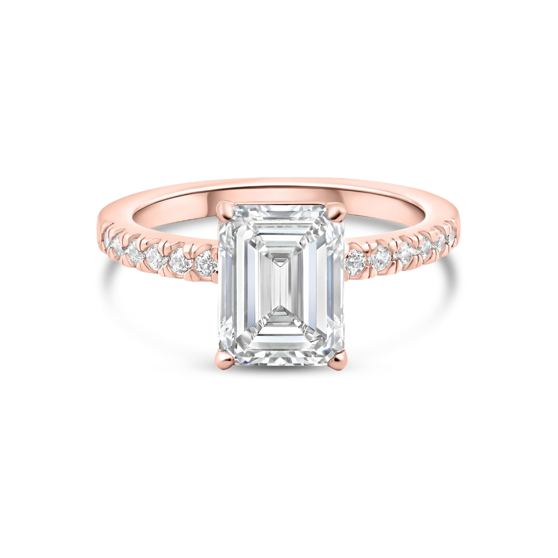 stunning rose gold emerald cut engagement ring on white background