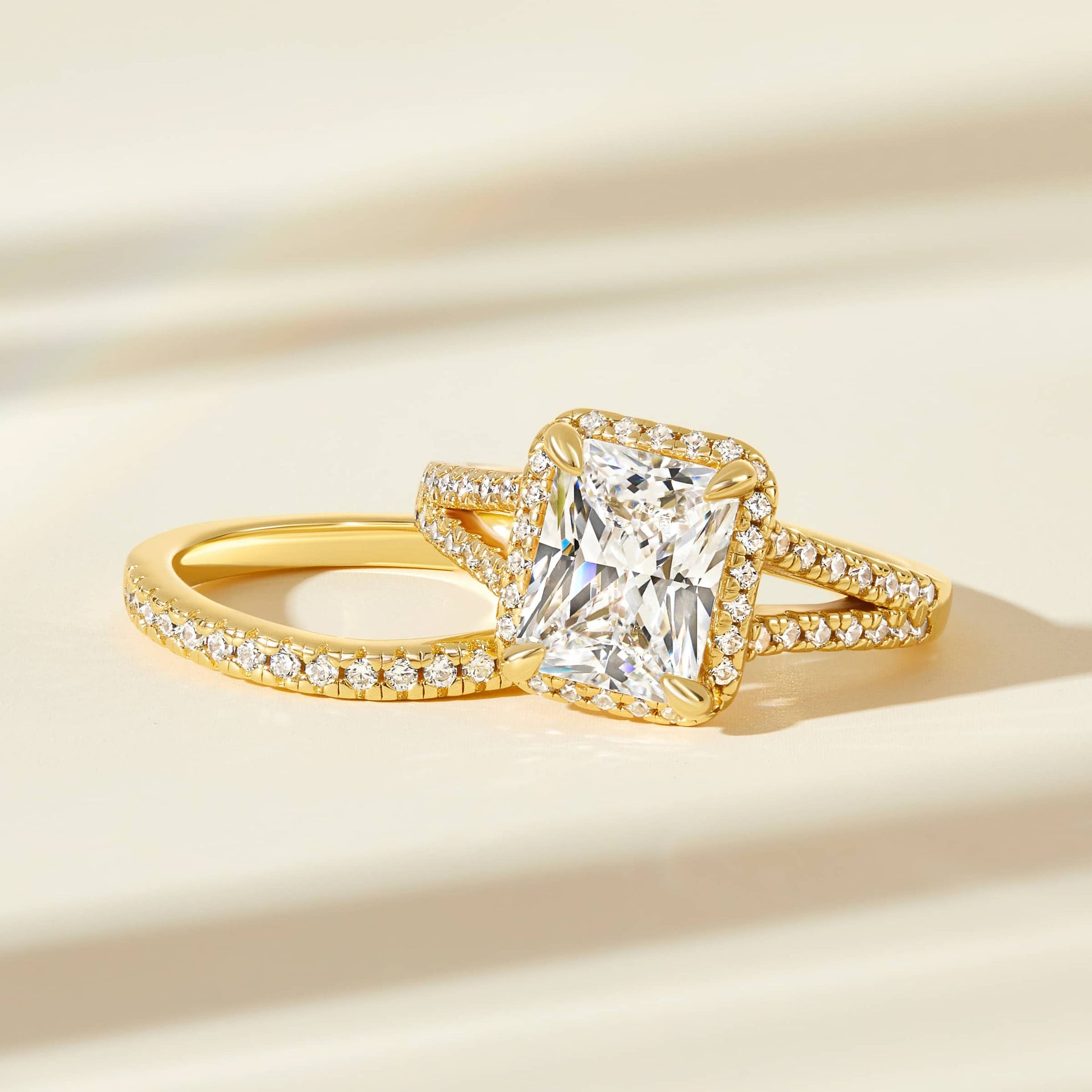 stunning flatlay of the evelyn wedding ring set shown in gold