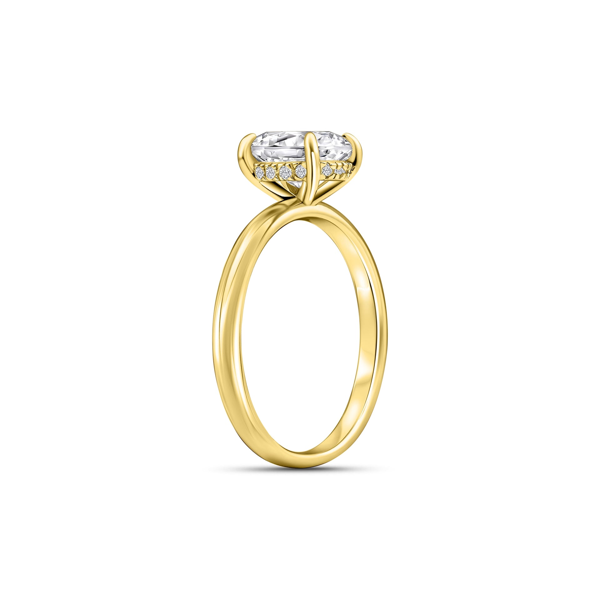 beautiful gold solitaire engagement ring on white background with hidden halo