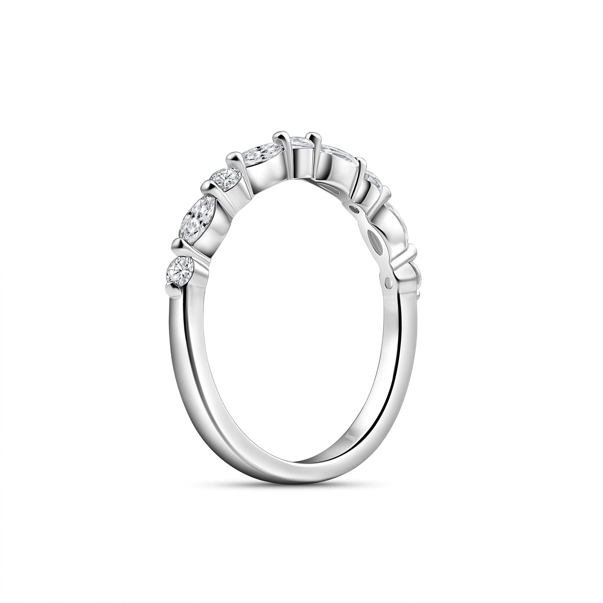 side profile of silver pave wedding band on white background