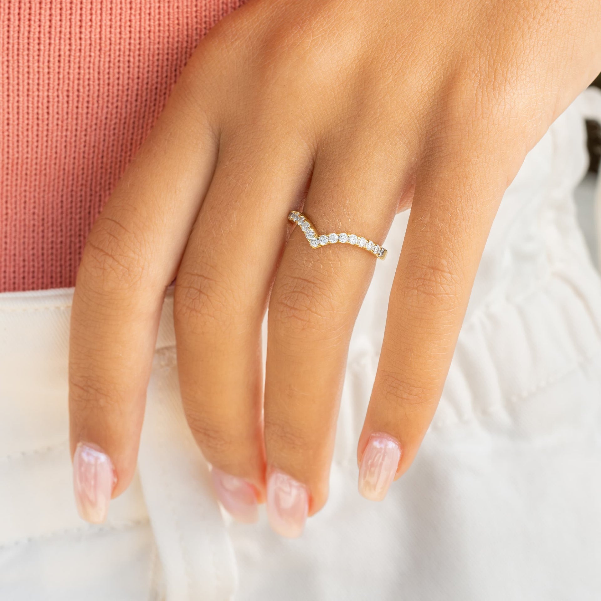 woman wearing unique gold wedding band