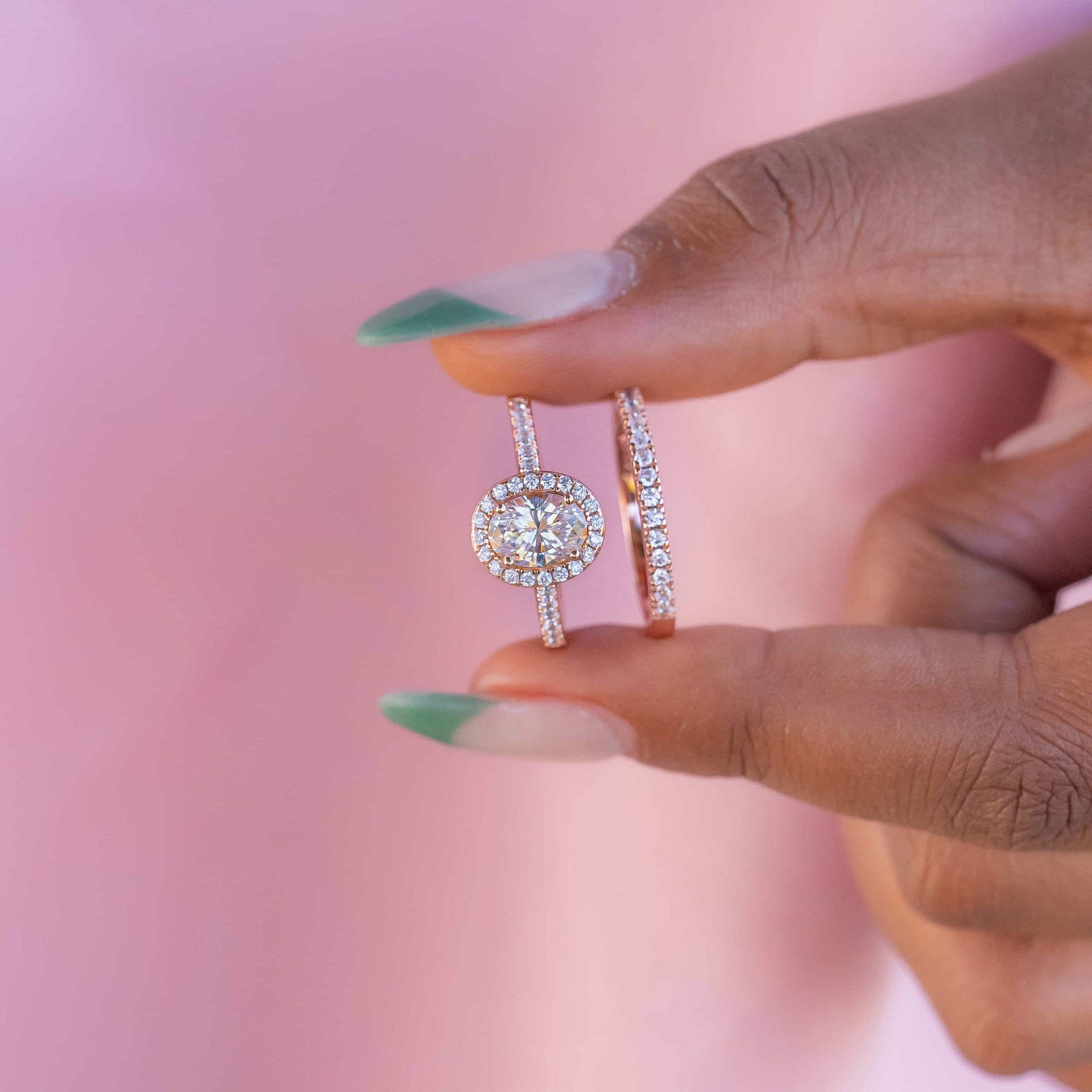 Female hand with a unique oval cut engagement ring