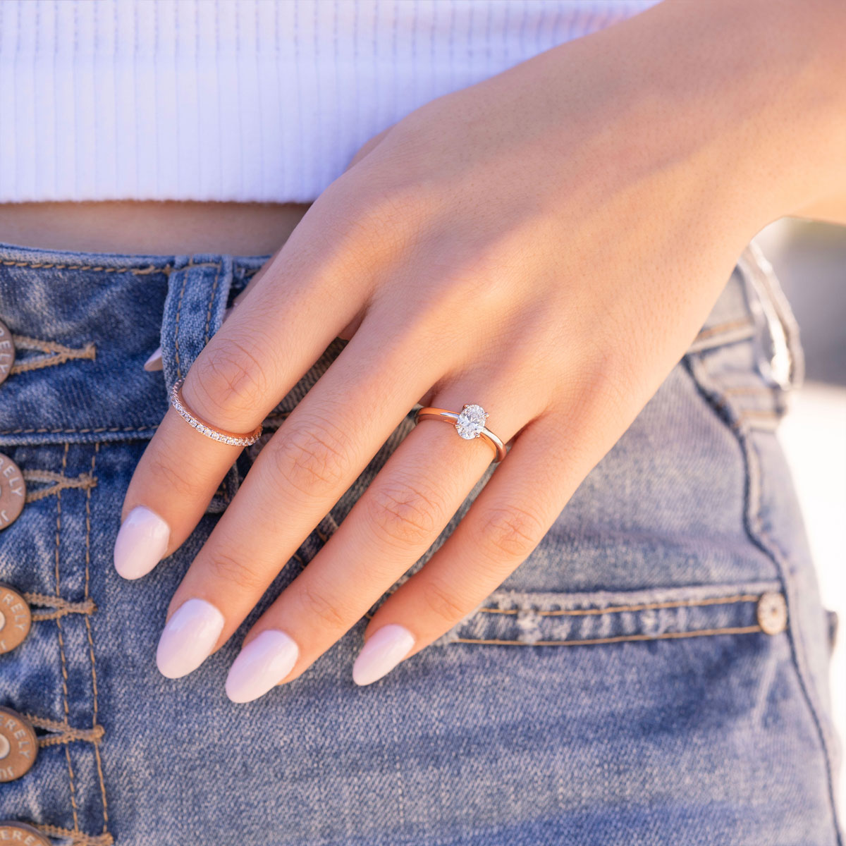 Cute rose gold oval ring on hand