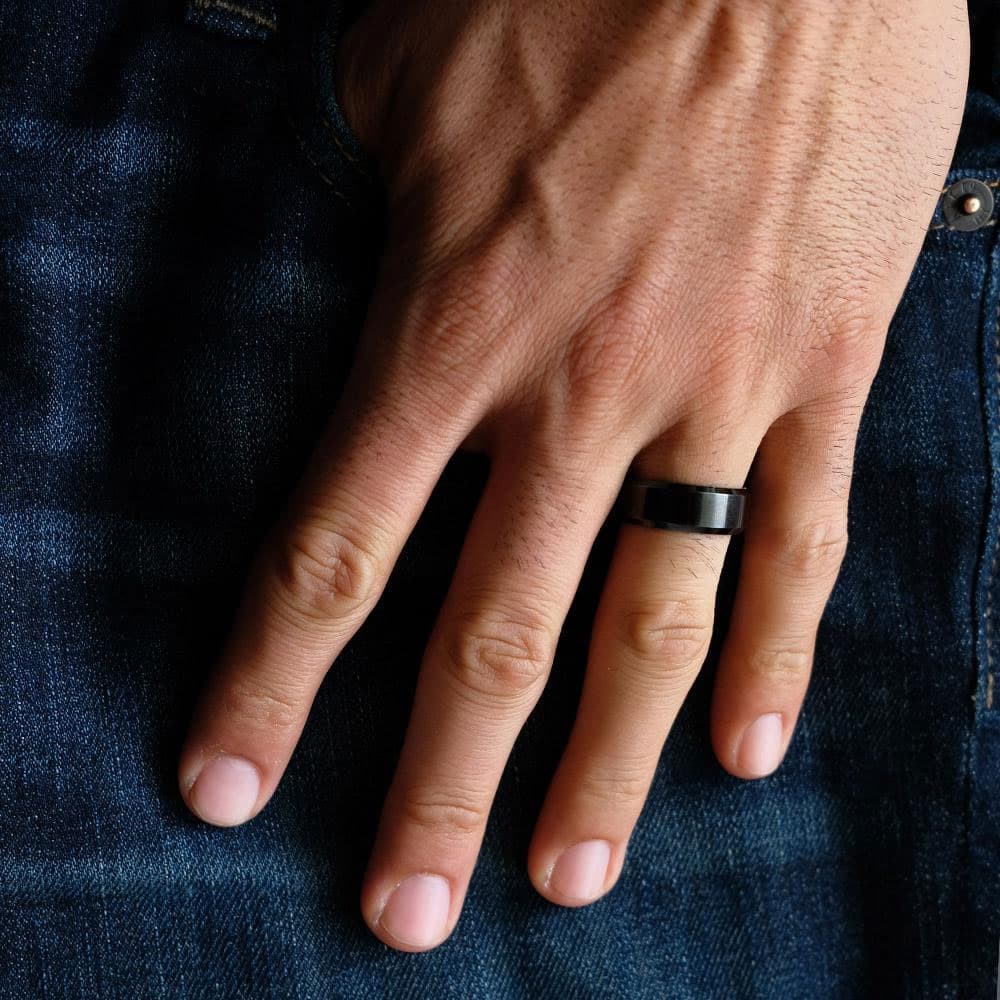 guy wearing the titan black mens wedding ring