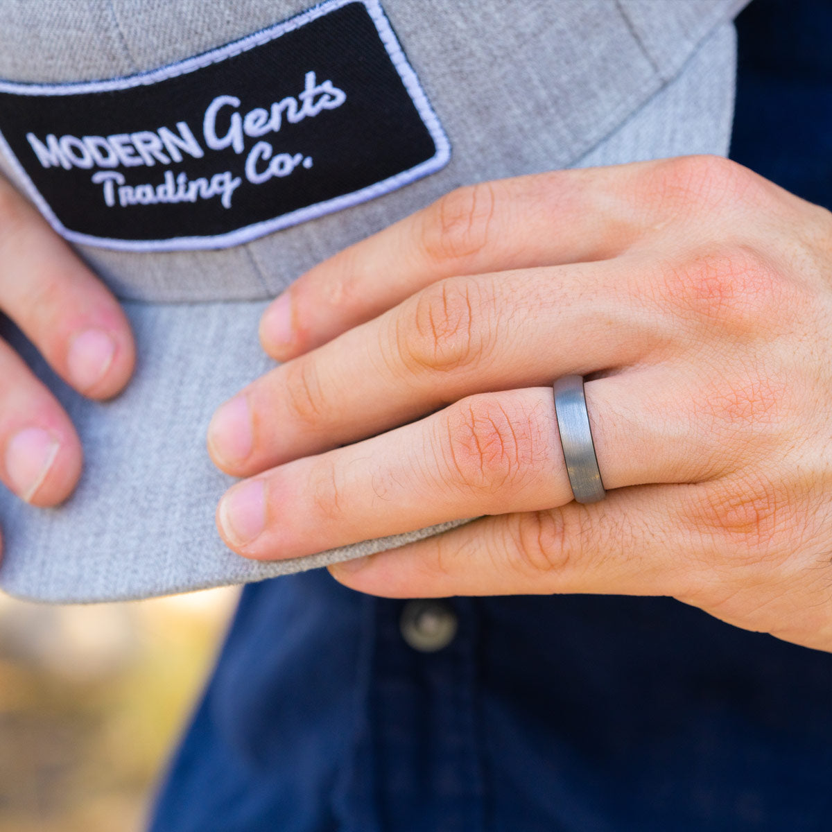 Man wearing brushed silver ring